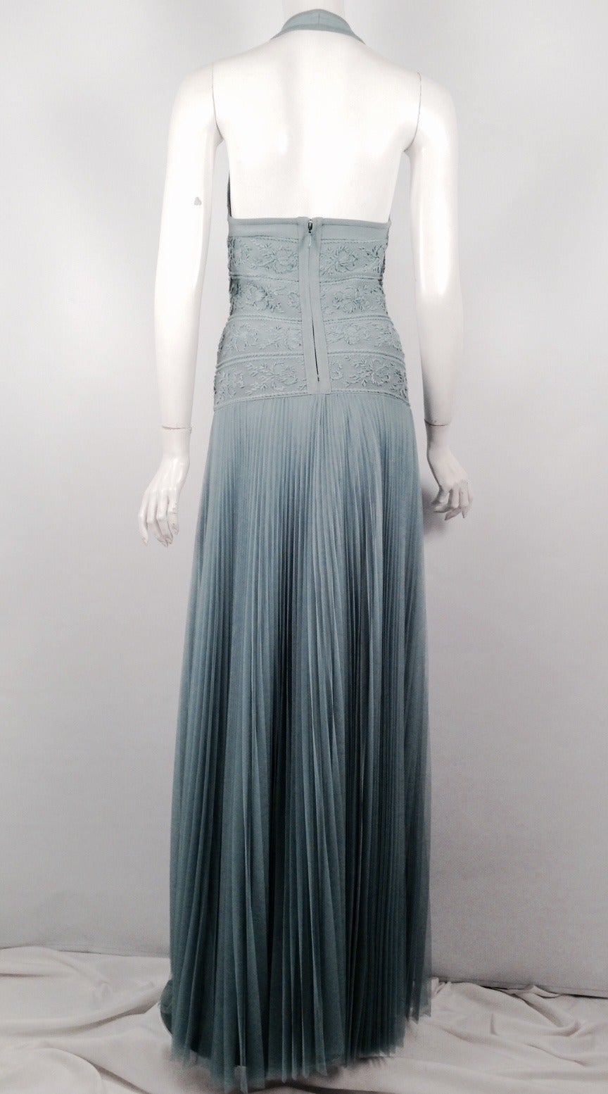 Gown with embroidered bodice and full skirt is an excellent example of Herve Leger's 