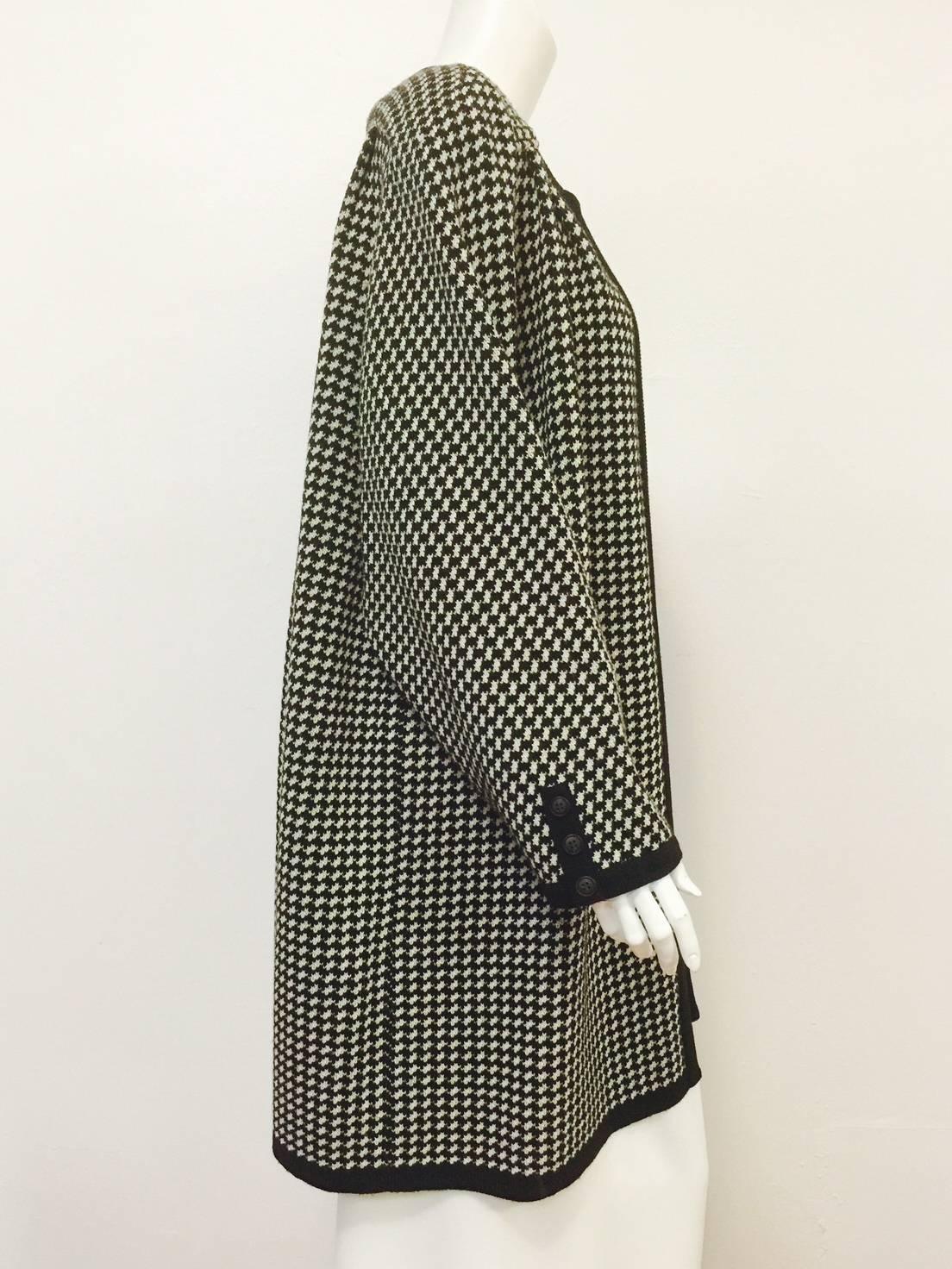 Miss V Wool Houndstooth Sweater Coat is typical Valentino Garavani!  Classic and feminine swing silhouette is enhanced with ultra-luxurious wool.  What could be more classic than the combination of black and white to keep you cozy?