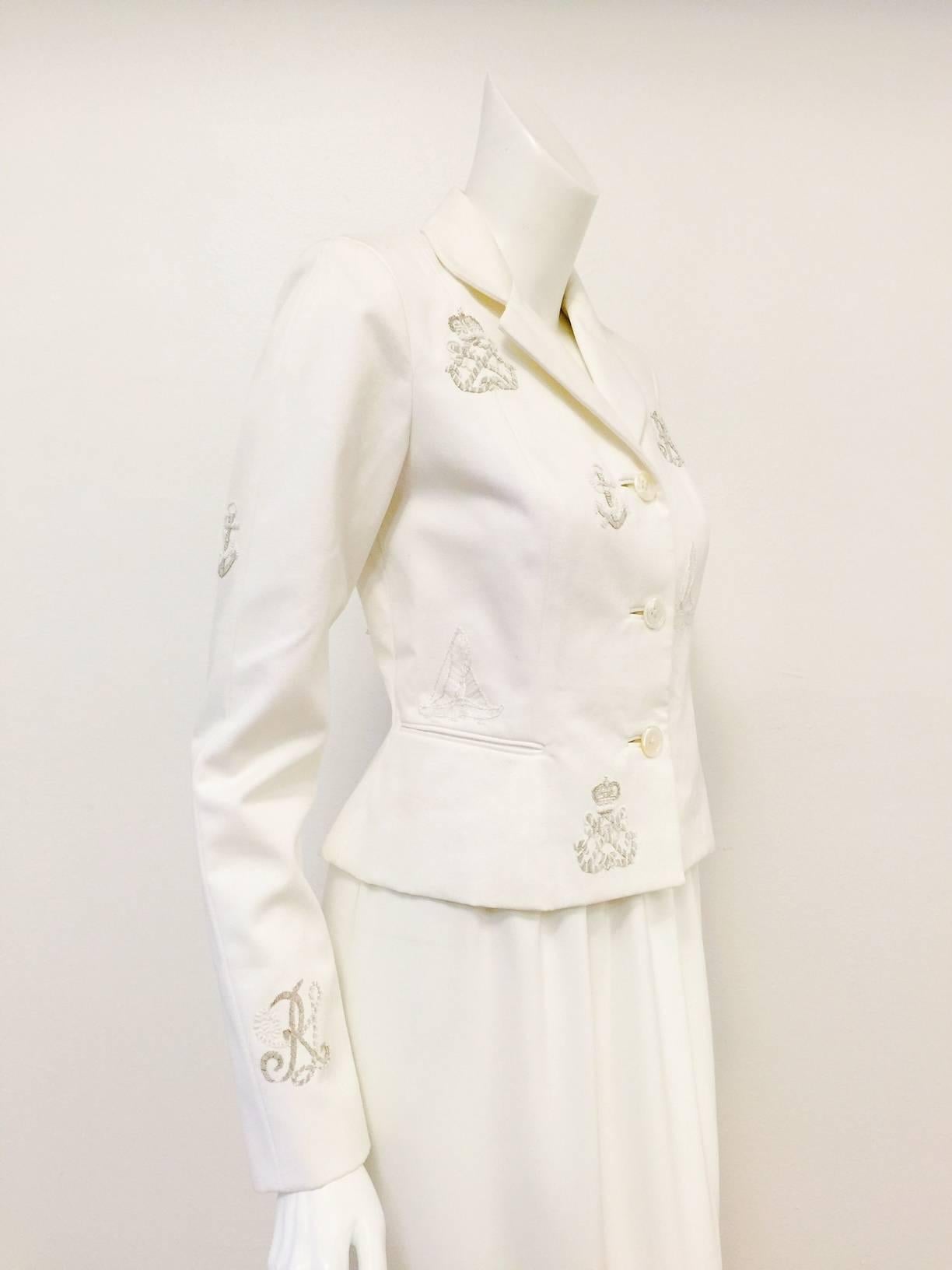 Embroidered white cotton Jacket is truly worthy of Ralph Lauren's Collection!  Features exquisite cotton fabric,fitted, cropped silhouette, and two sewn welt pockets.  Notch lapel, slightly padded shouder, and three 
