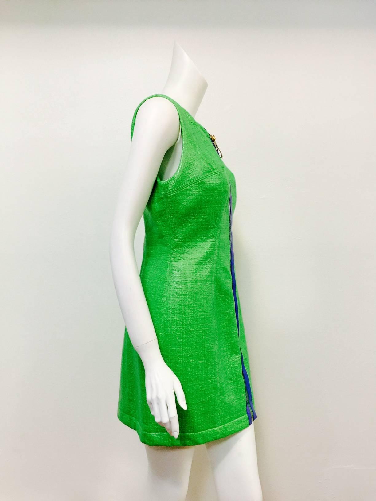 New Versace Sleeveless Sheath illustrates why Milian is considered a Fashion Capital! Deceptively simple design is elevated by a technologically advanced cotton blend with polyurethane finish and lavender patent leather trim!. Must be seen to be
