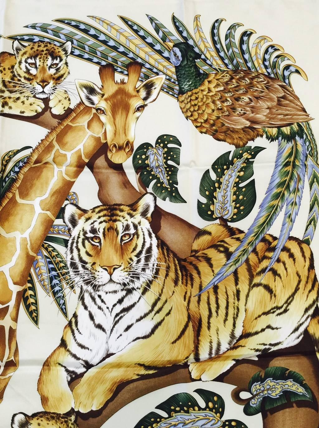 New 100% Silk Twill Scarf is typical Salvatore Ferragamo...Luxurious and Exotic! An ivory border surrounds exotic large cats, including leopards and tigers, a girfaffe and even wild fowl.  The 
