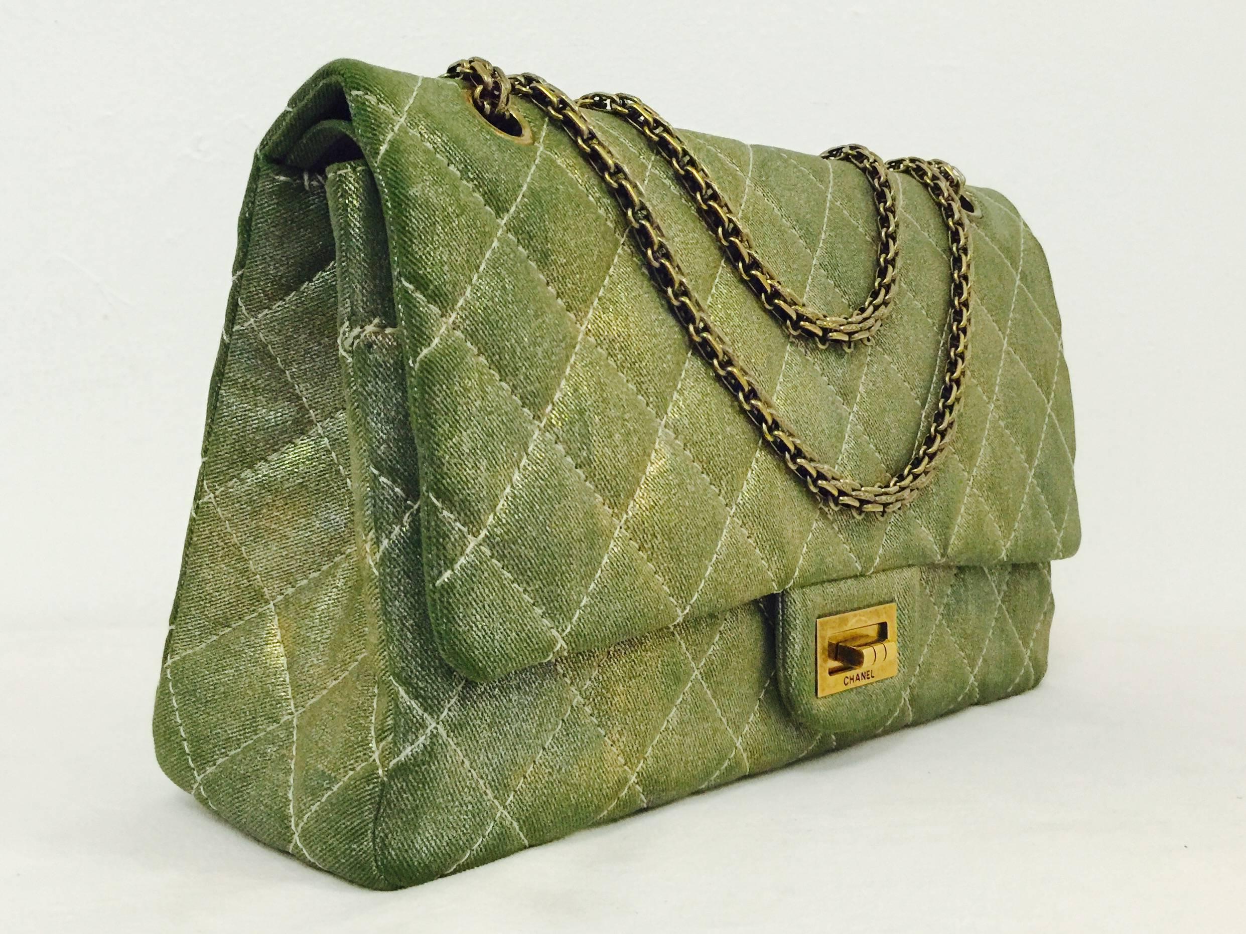  Chanel Ltd Edition 2.55 Reissue 227 is a must for collectors of all things Coco!  When crafted from diamond quilted green and gold metallic fabric, the classic Chanel bag becomes trendy and timeless at the same time!   It's all here. Double bijoux