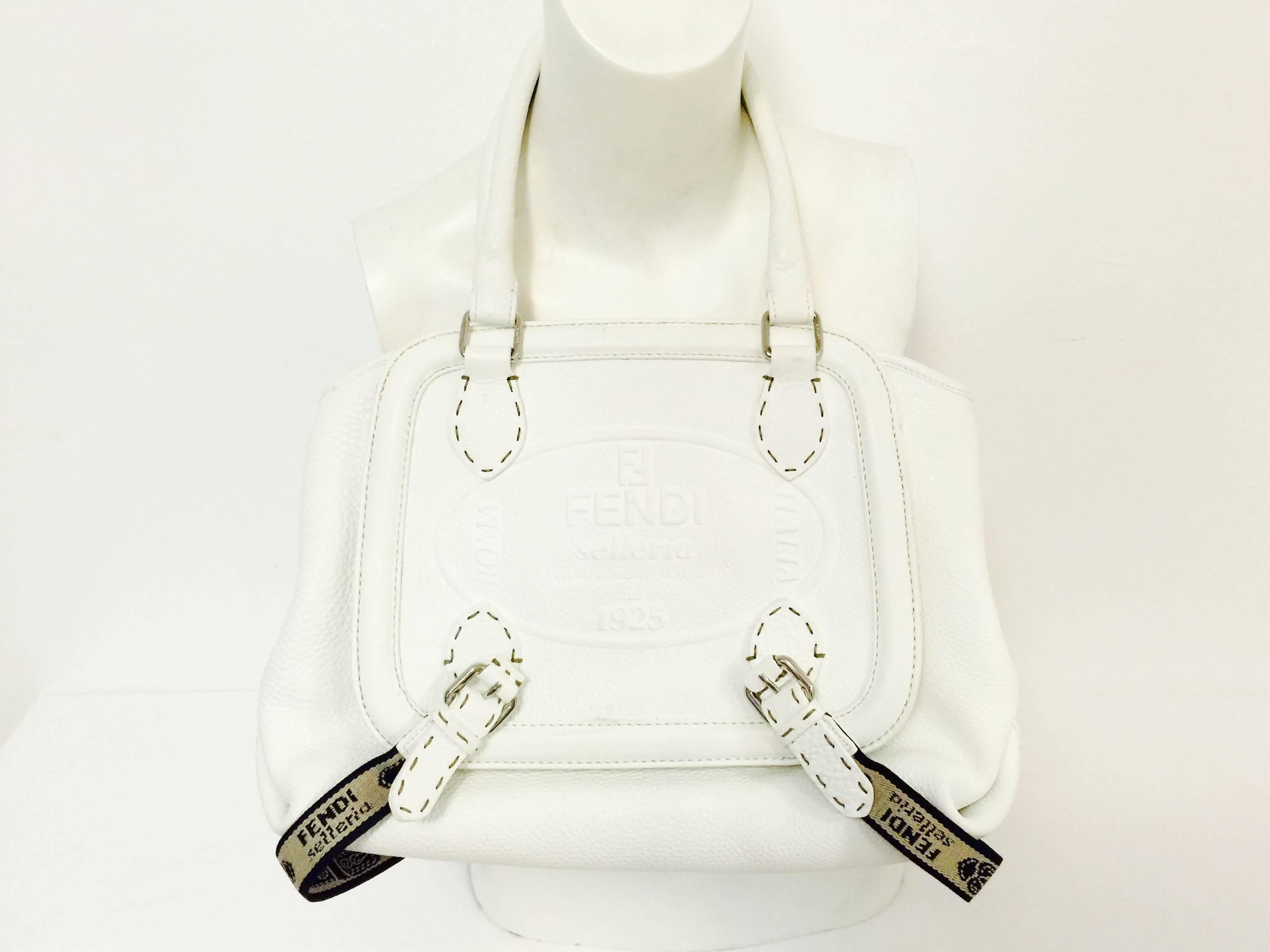 Fendi Selleria White Grained Leather Satchel With Staps is a must for connoisseurs of fine handbags in general and Fendi in particular!  "Selleria"...reserved for Fendi's most luxurious line of handbags, features extensive hand crafting