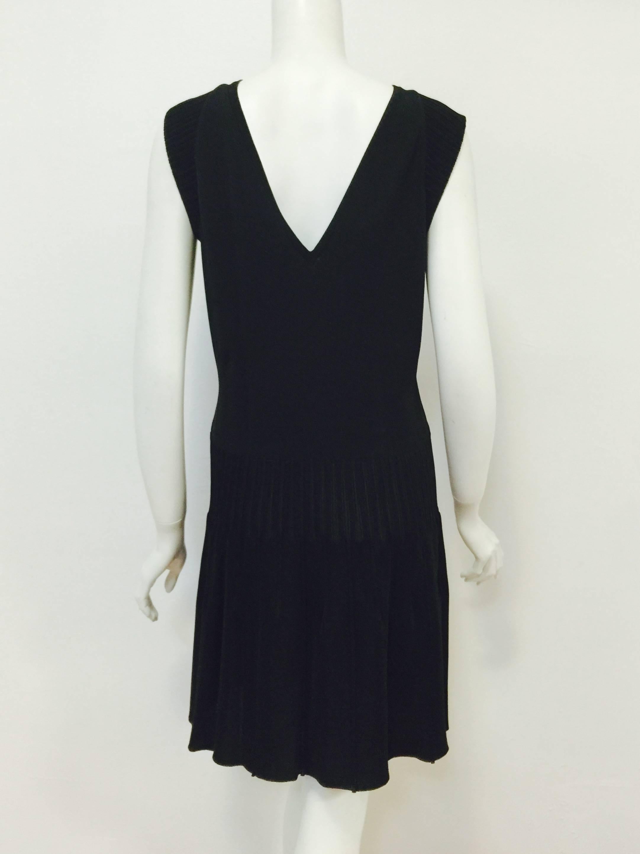 Chanel Black Knit Cap Sleeve Dress With V Neckine and Dropped Waist In Excellent Condition In Palm Beach, FL