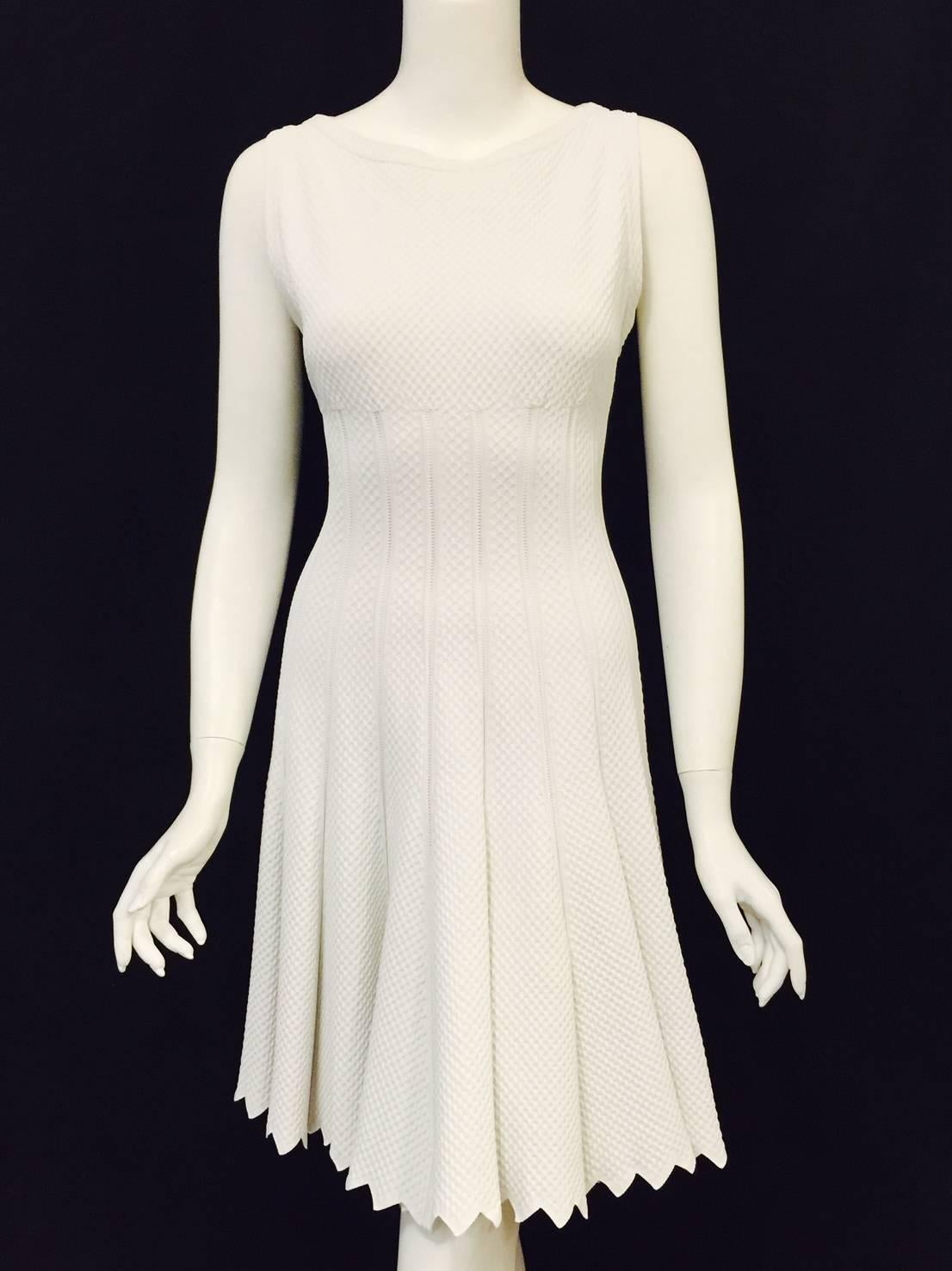 White Sleeveless Stretch Dress proves why Alaia is one of fashion's most celebrated designers!  Dress features the technologically advanced stretch material that Azzedine has called his signature since the 1980s.  Body conscious?   Alluring?  But of