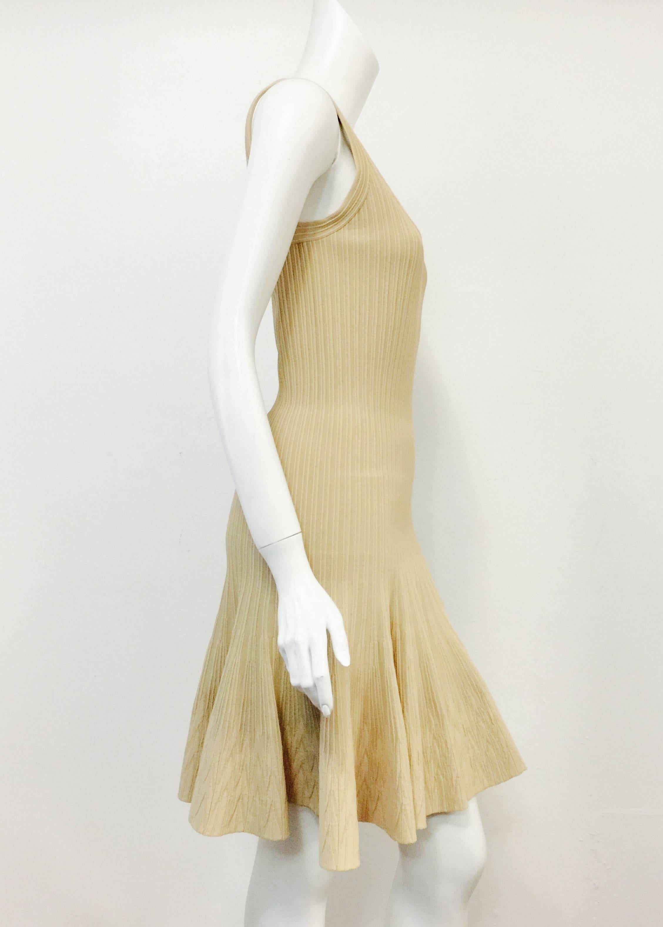Butter Cream Sleeveless Stetch Dress illustrates why Azzedine Alaia is considered one of fashion's most influential designers of the past 50 years! Dress features the technologically-advanced, stretch, ribbed material that Azzedine has called his