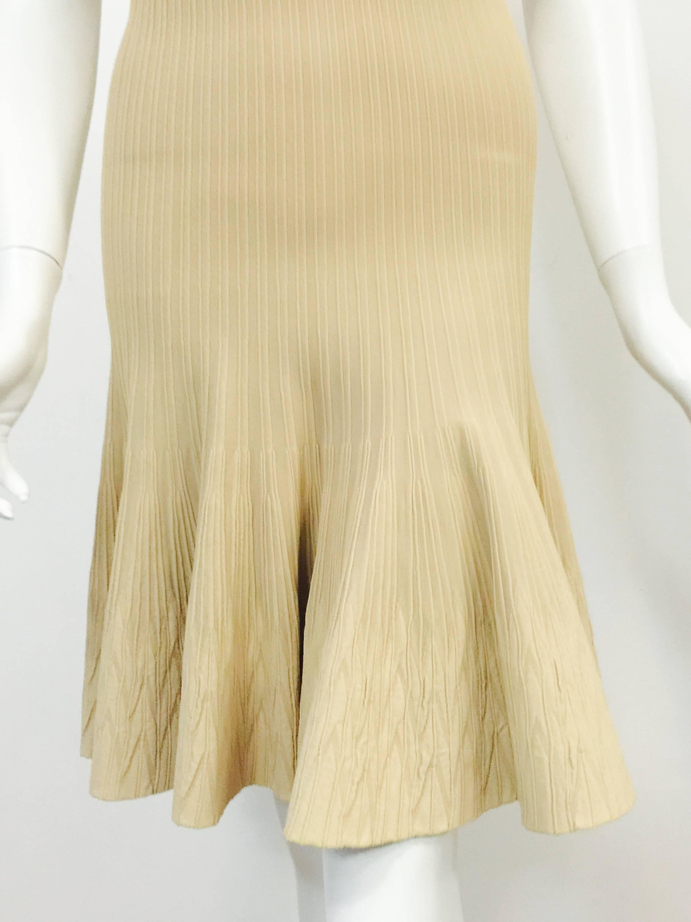 Alaia Paris Butter Cream Sleeveless Body Conscious Dress With Flounce Skirt  In Excellent Condition For Sale In Palm Beach, FL