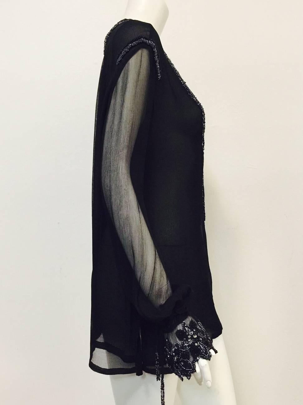 Just Cavalli Black Silk Tunic is sophisticated and chic with just the right amount of 