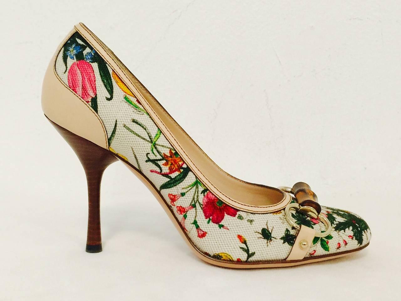 Gucci Floral Print Pumps are perfect for Spring and Summer!  Features instantly recognizable Gucci print with tan leather soles, insoles, lining and counters.  Bamboo bits?  Absolutely!  4