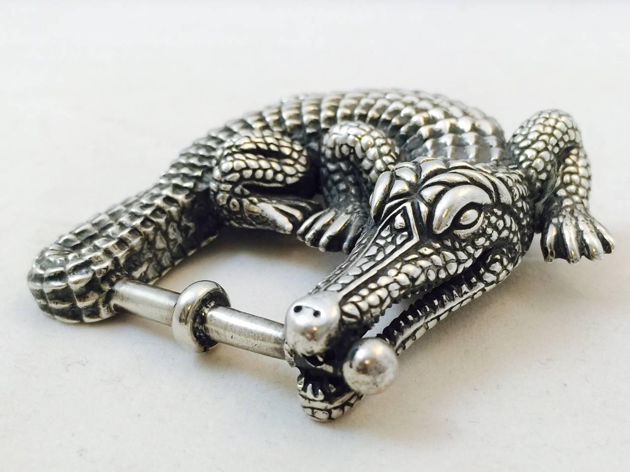 THE ART GOES IN BEFORE THE NAME GOES ON ™.  This has been not only the trade mark of Kieselstein Cord but their consistent design mantra.  An iconic sterling silver alligator serves as a fabulous buckle for your favorite 1