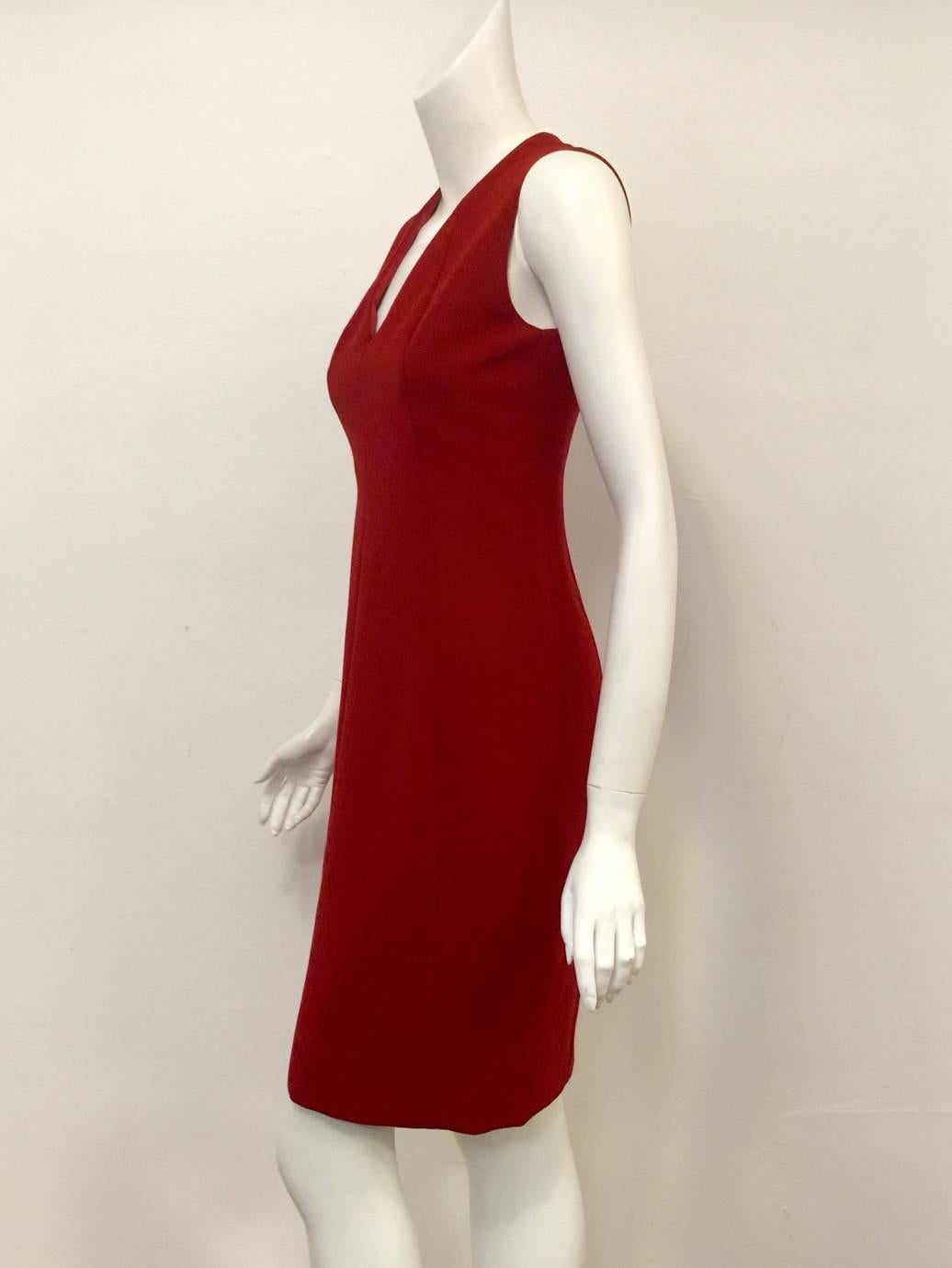 Investment dressing at its best!  Based in Switzerland, Akris has become a favored brand of executive women worldwide.  No nonesense, Akris Cranberry Stretch Wool Sleeveless Sheath will quickly become a favored 