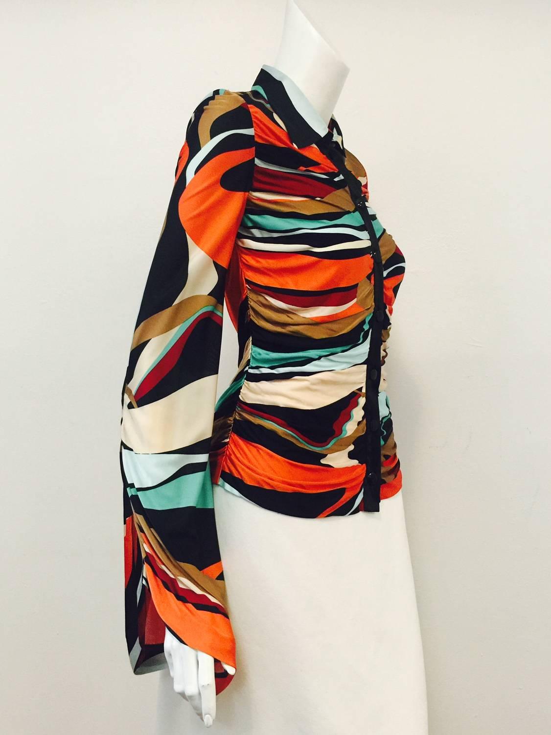 Abstract Viscose Blouse proves that Missoni is so much more than multi-color knit pieces!  Features vibrant and unforgettable Earth tone print that perfectly transitions from Late Summer to Early Fall to Holiday Season!  Ruched, body conscious