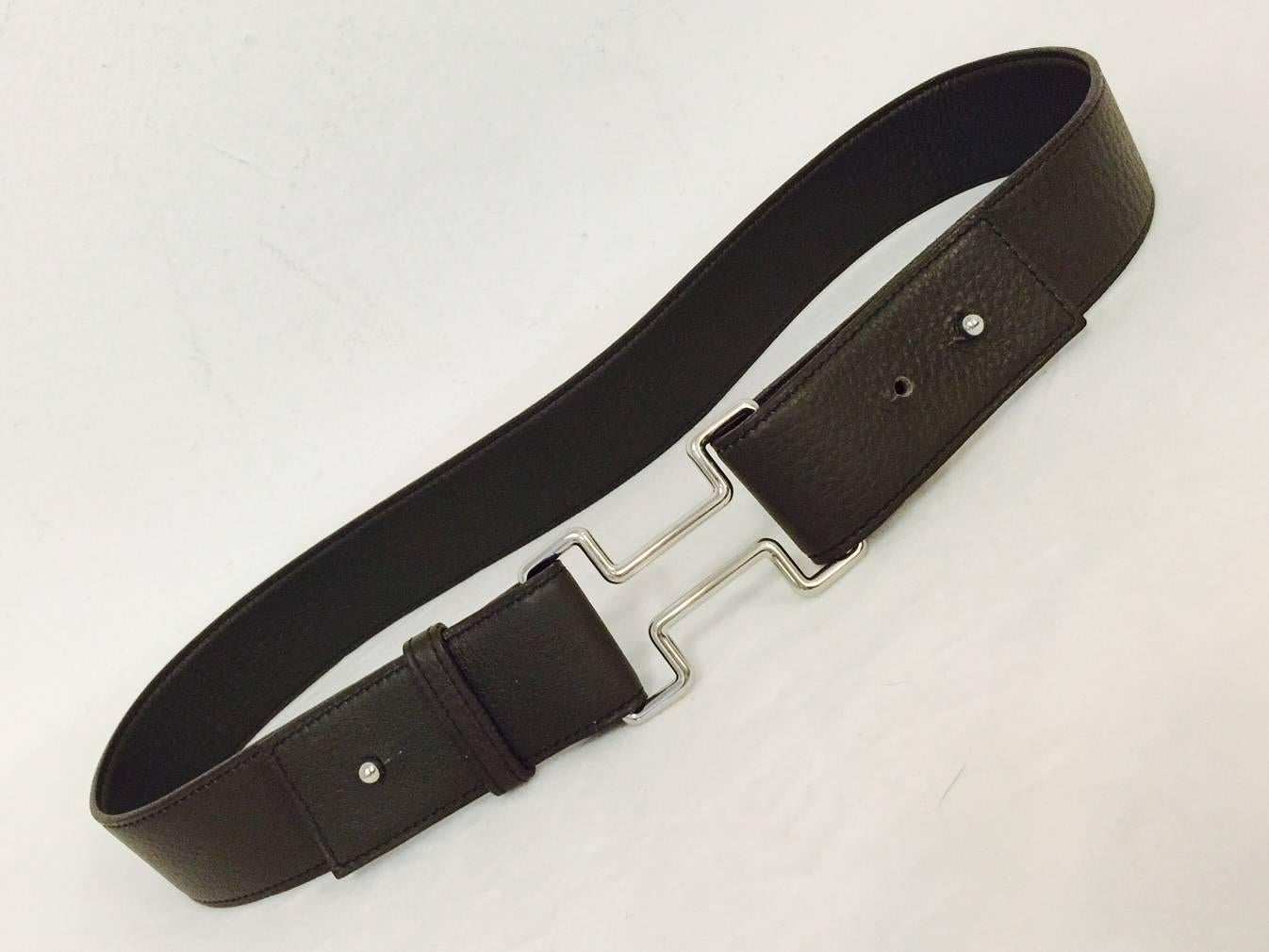 Perfect for a Man or a Woman!  Hermes Brown Wide Belt features Togo Leather and a stylized version of the world famous "H" buckle.  A wonderful addition to any collection of fine belts.  Made in France. Above Excellent Condition.  Crafted