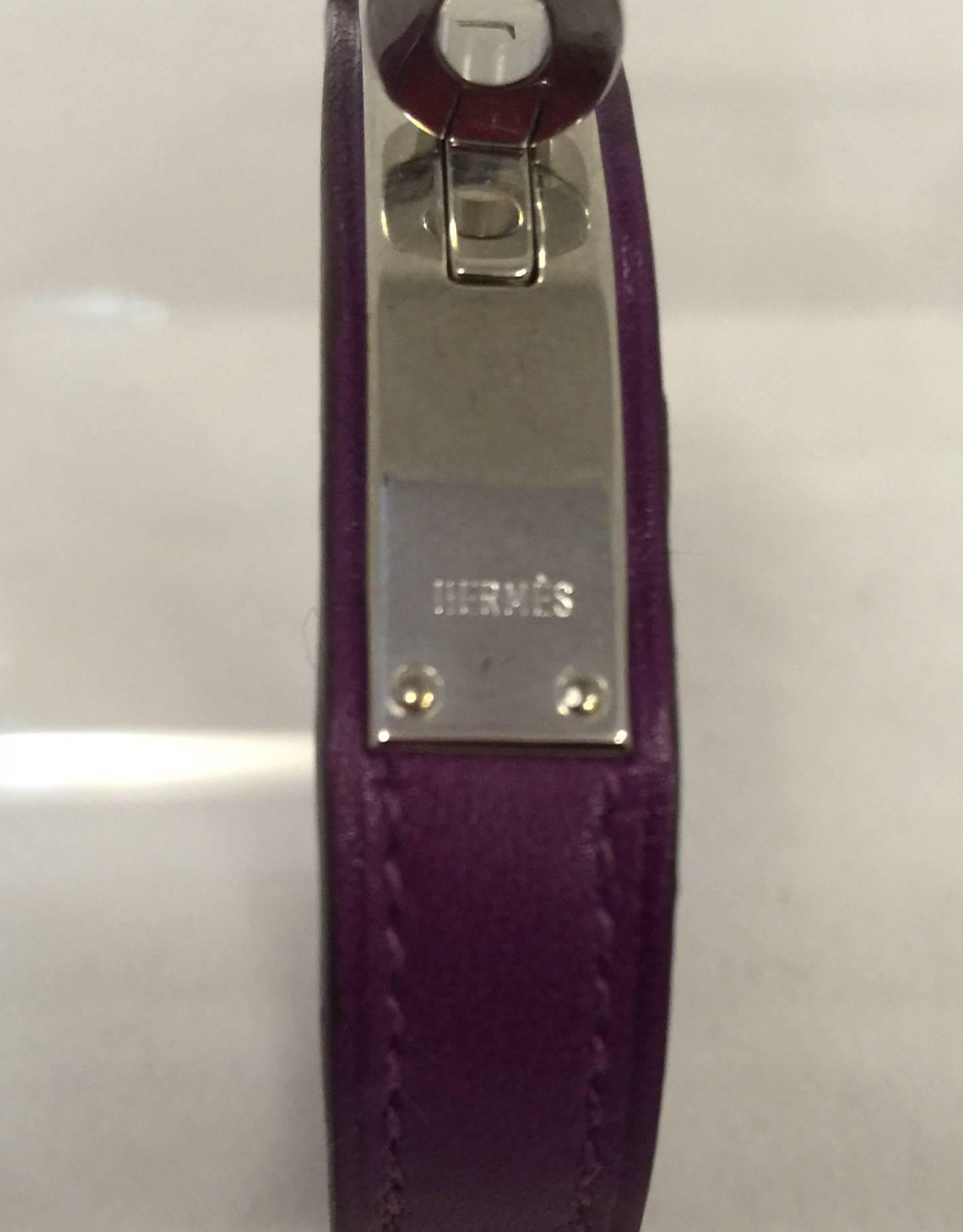 Purple Micro Kelly Bracelet With PHW is a must for any lover of all things Hermes!  Go ahead...pile them on!  Features alluring purple leather and signature PHW closure.  Made in France?  But of course.  Date Stamped 