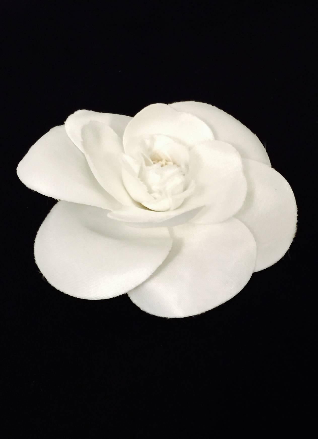 Chanel loved flowers...especially Camellias!  The Camellia, or "Chinese Rose", is a symbol of everlasting love and devotion.  Chanel's fascination with this particularly short blooming flower is evident...it is as part of Mademoiselle's