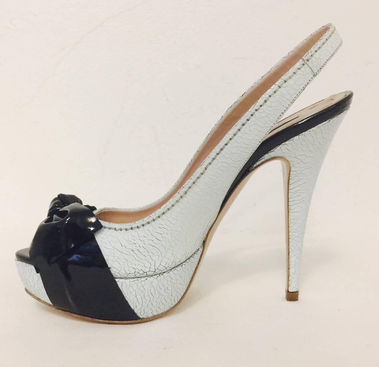 Miu Miu White Cracked Leather Platform Slingbacks With Black Patent Leather Bows In New Condition In Palm Beach, FL