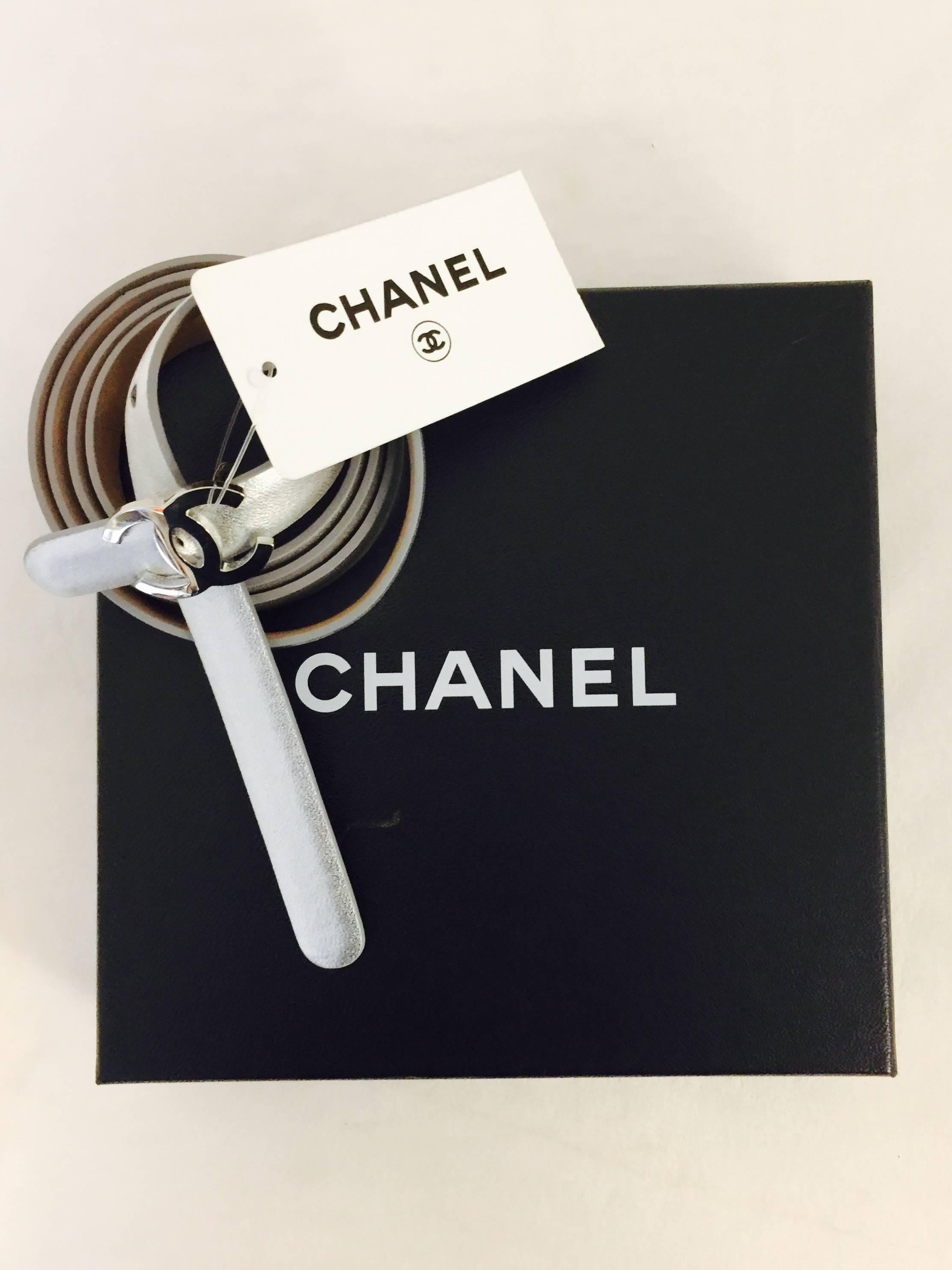 New 2012 Chanel Silver Metallic Leather Skinny Belt W. Signature Logo Buckle  In New Condition In Palm Beach, FL