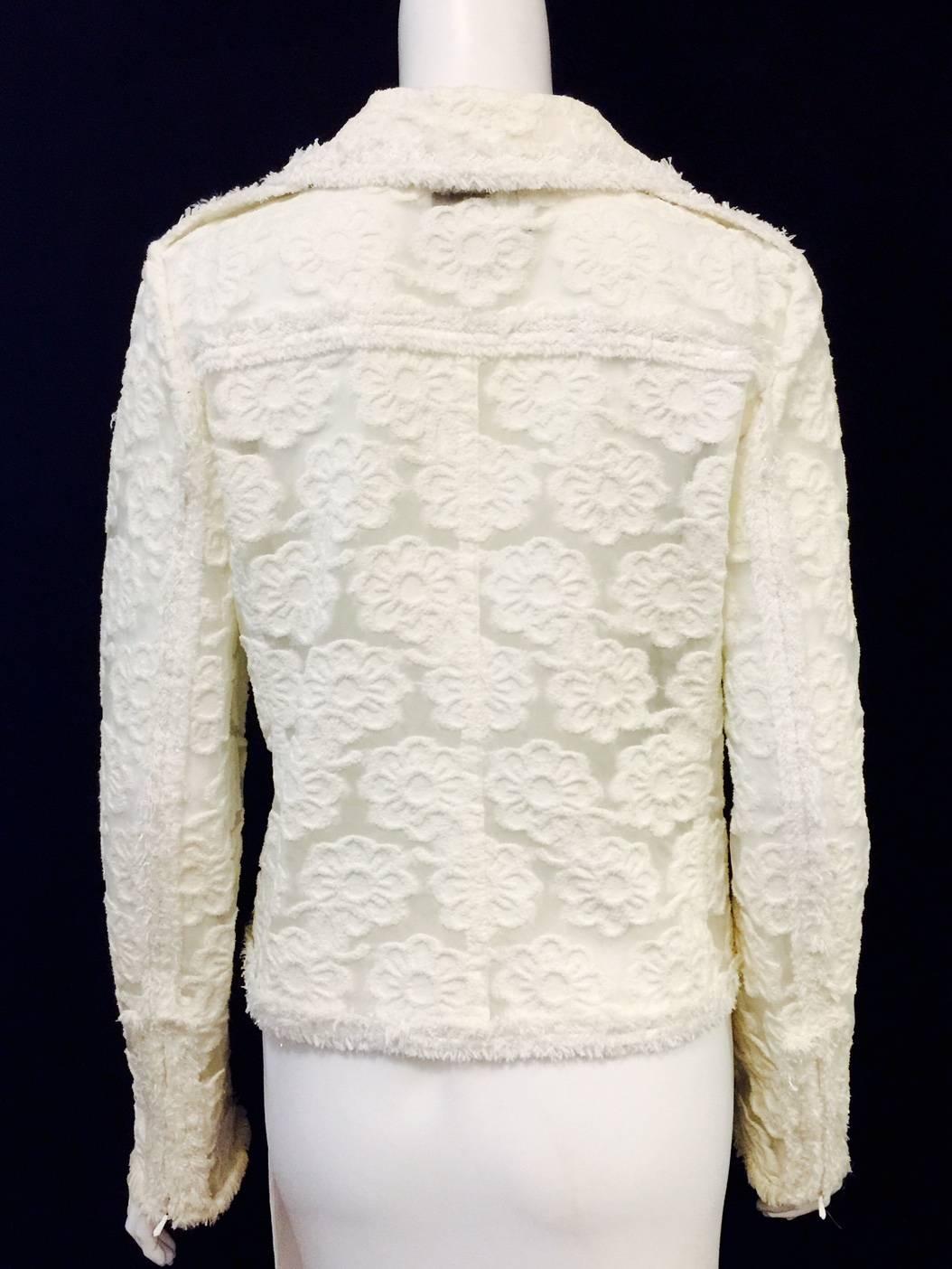 2009 Cruise Chanel Ivory Polyurethane Biker Jacket With Camellias Allover  In Excellent Condition In Palm Beach, FL