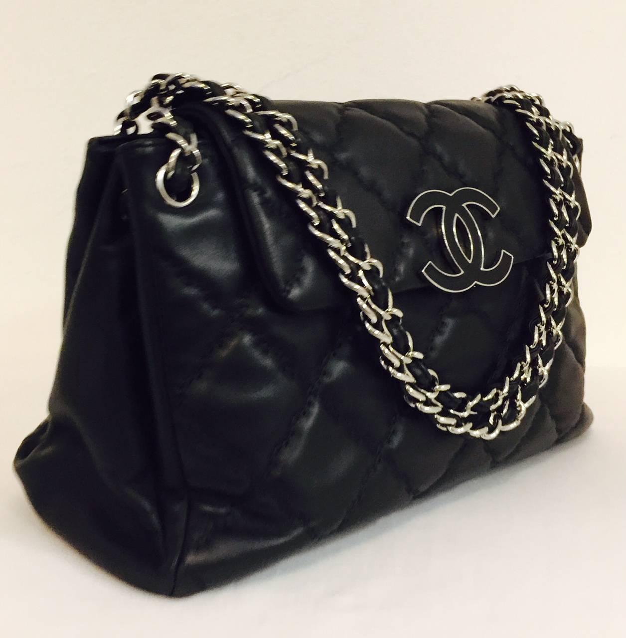 Chanel Black Diamond Quilted Hampton CC Accordion Flap Bag works equally well in 