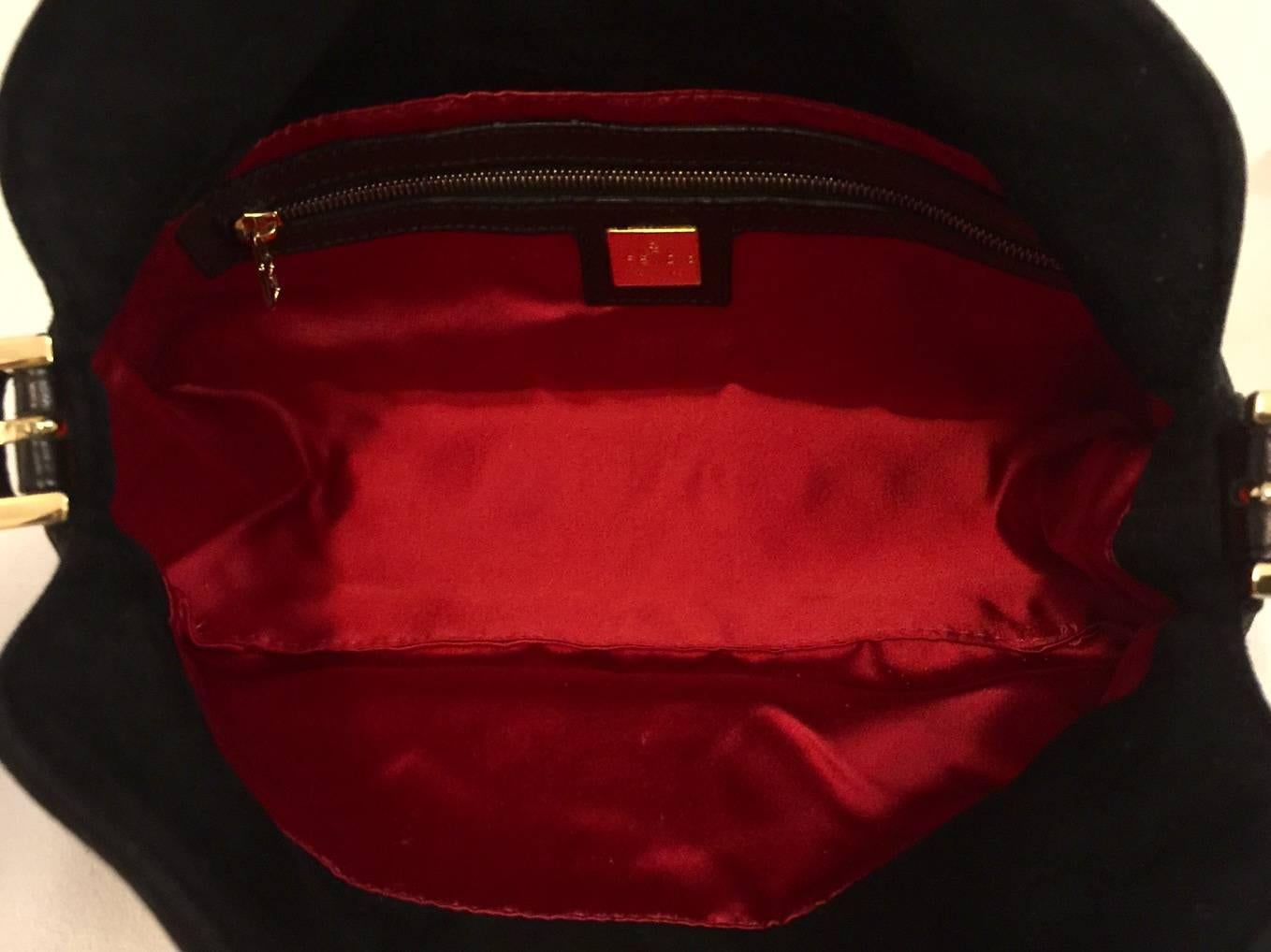 Iconic Fendi Black Suede Baguette Bag With Gold Tone Zucchino Logo Closure  5