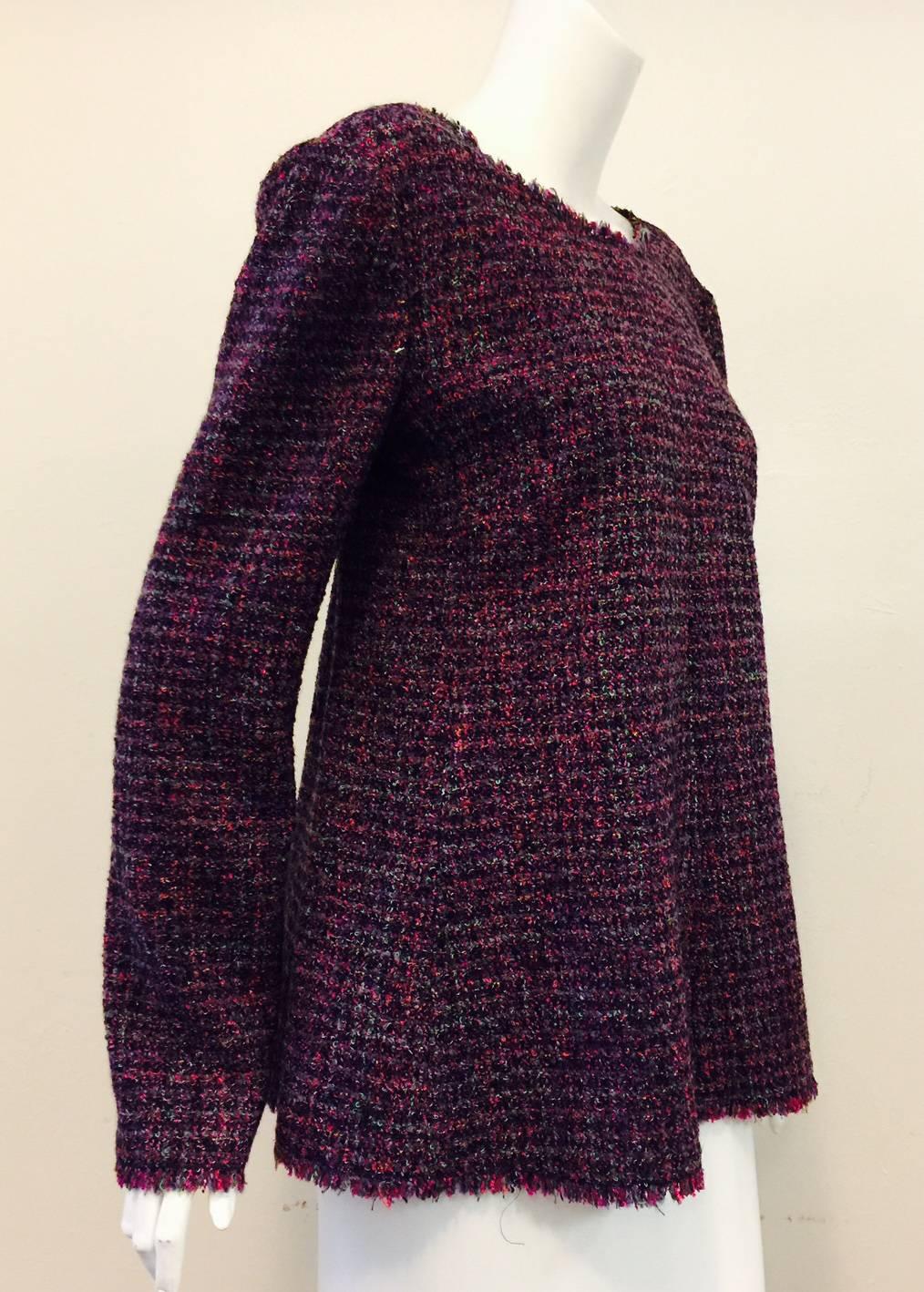 Chanel uses tweed for more than just jackets and skirts!  Aubergine Raspberry and Mint Multi Color Tweed Top is versatile and pure "Coco".  Features modern and sophisticated "swing" silhouette, rounded collar, and rear hidden