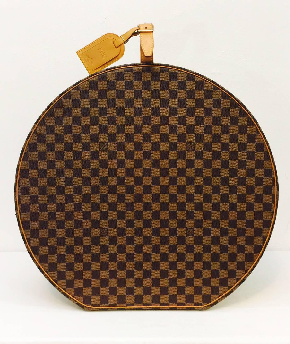 The Louis Vuitton Boite Chapeaux Damier Ebene 50 Travel Round Case is more commonly known as the 