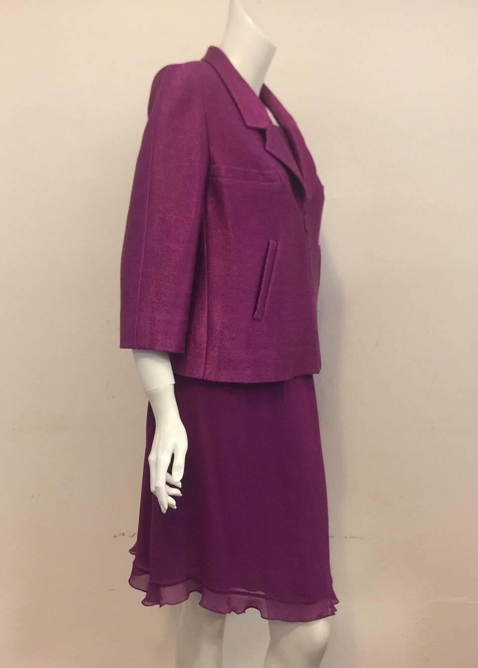 Chanel is so much more than boucle and tweed!  For 2001 Spring Lagerfeld designed this Plum Ensemble that pays homage to classically feminine pieces while updating with a slightly 
