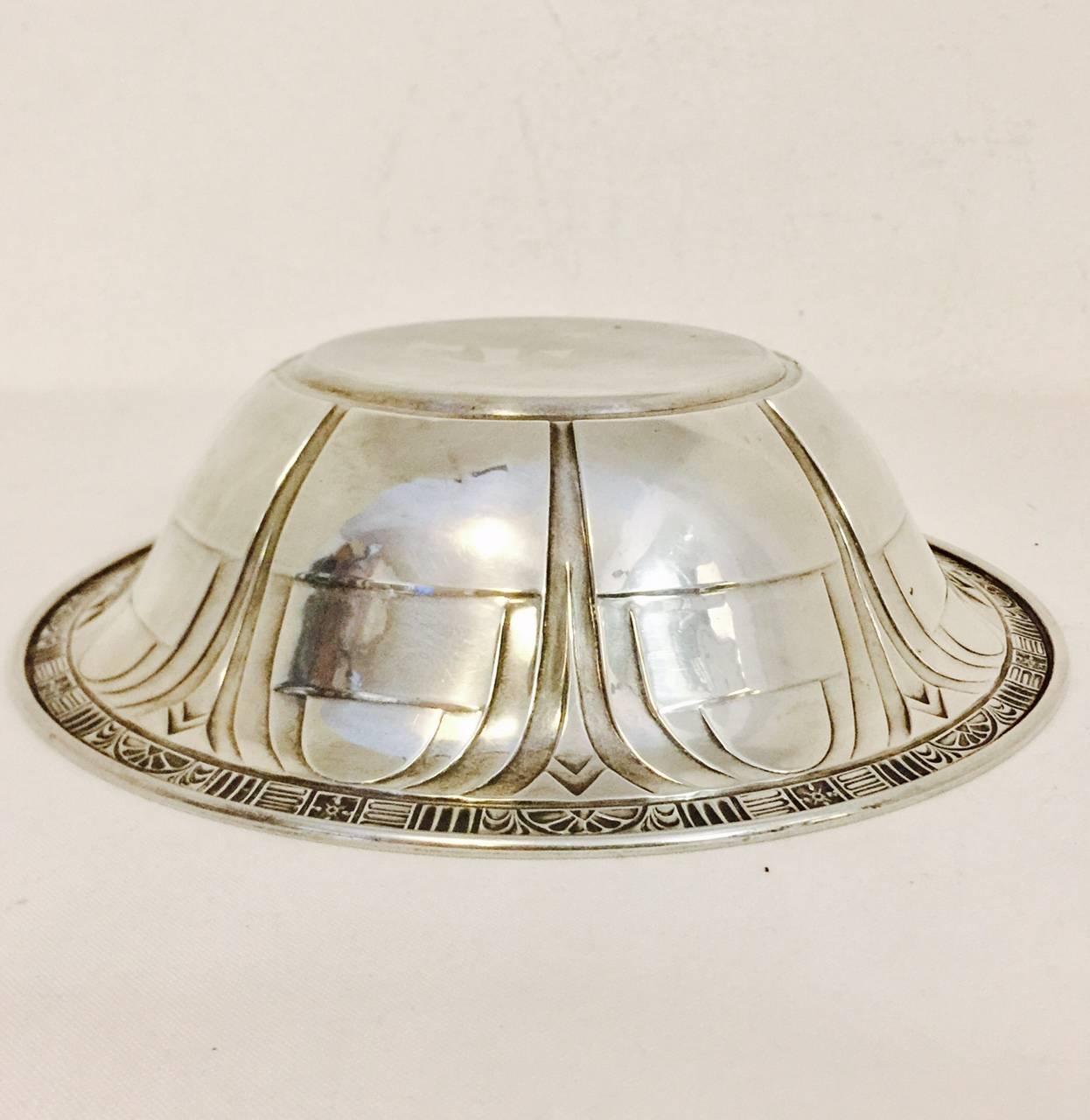 This is an extremely rare bowl . Made in limited edition in 1930, this pattern is featured in exhibition in the Dallas Museum of Art, and listed in Modernism in American Silver by Jewel Stern, page 87.  Only a luncheon plate and this bowl are found