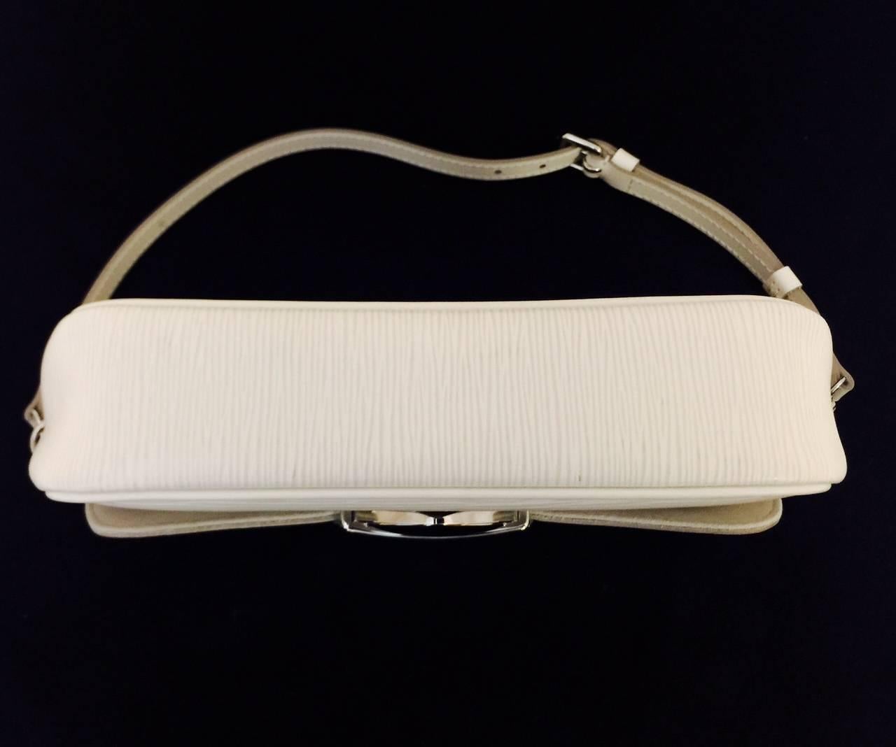 Louis Vuitton Ivory Epi Pochette Montaigne In Excellent Condition In Palm Beach, FL