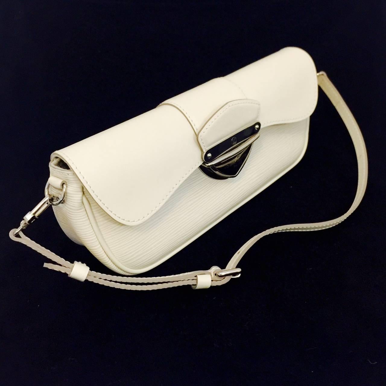 Ivorie Epi leather Montaigne clutch is a must for any collection celebrating all things 