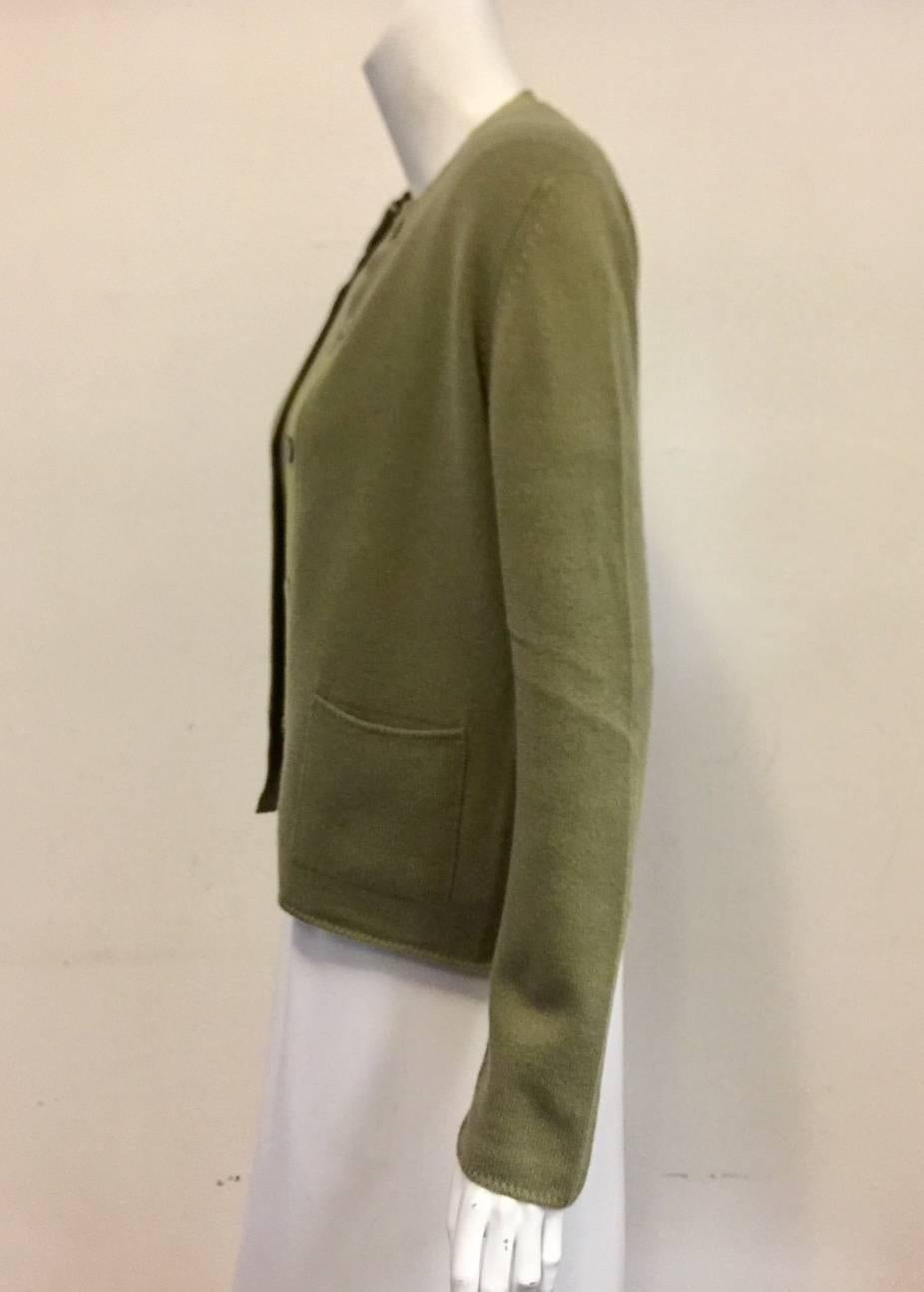 Made in the United Kingdom, this Chanel Olive Twinset is a must for trips across the English Channel!  Features ultra-luxurious cashmere, classic 
