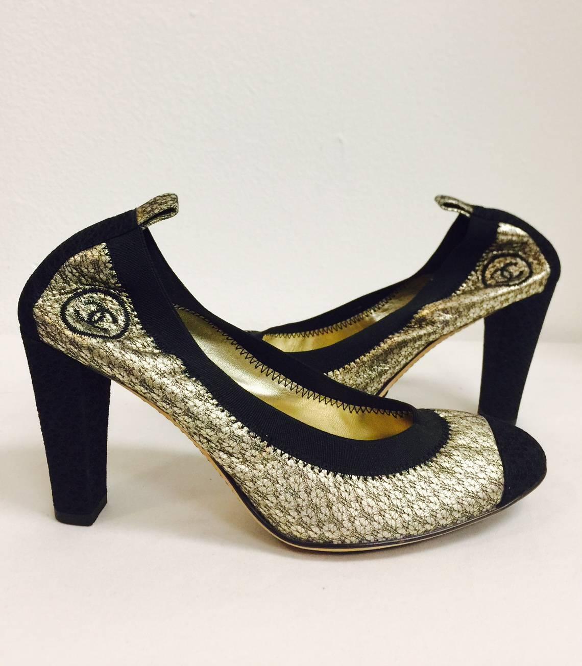 Chanel Antique Gold Metallic Leather and Black Brocade Pumps promise an unforgettable evening!  Features signature diamond quilted leather soles and antique metallic gold leather with feminine floral design. Metallic gold leather lining and insoles