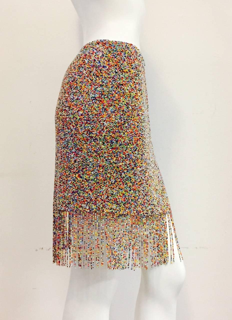 Ralph Lauren Purple Label Collection skirt is undoubtedly inspired by the world renown beading technique of the Maassai!  Features vibrant, multi color beadwork allover.  Weighty?  Yes!  Must be seen to be believed!  Rear hidden zipper with hook and