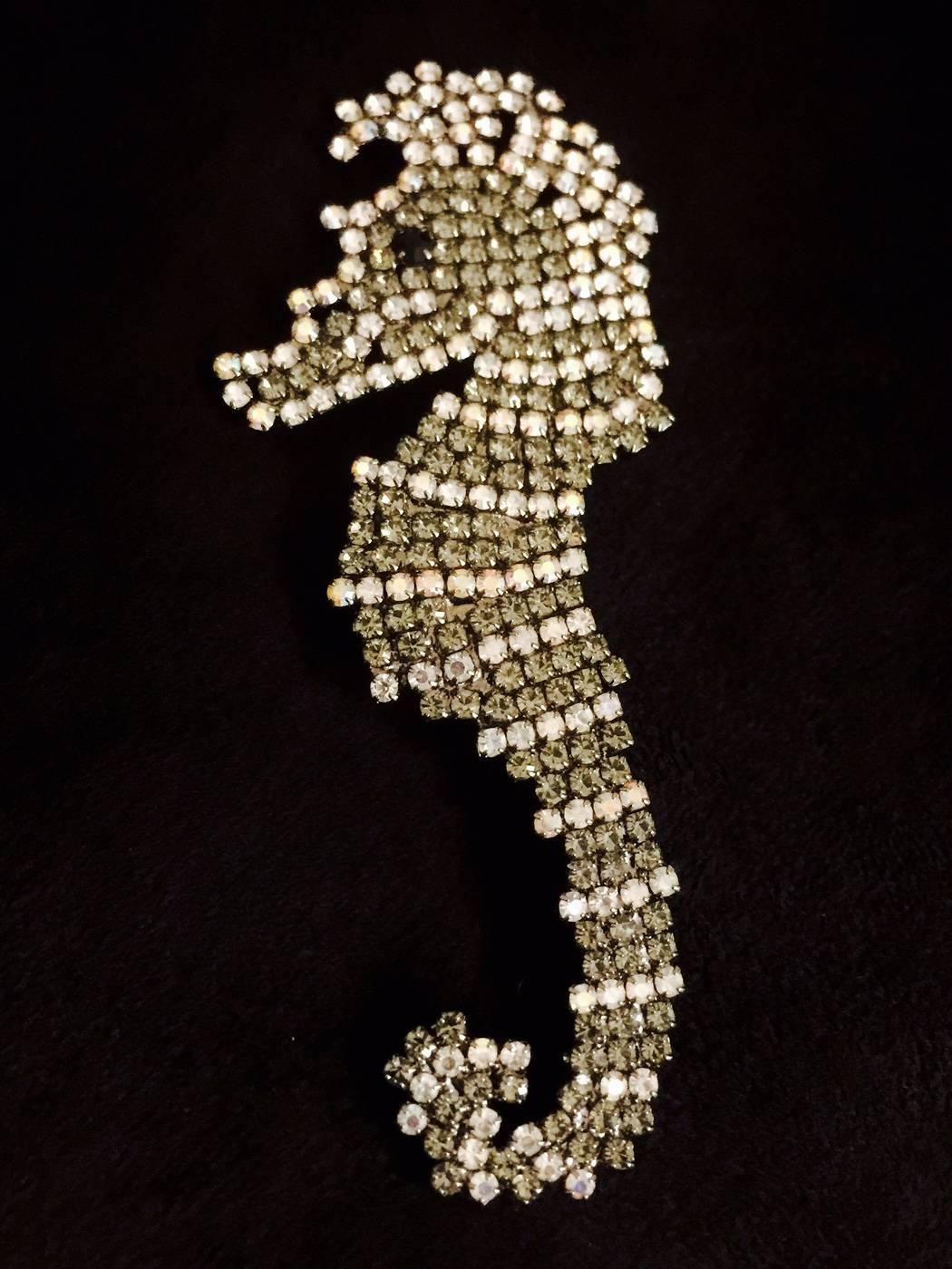 A must have summer accessory!  This large seahorse brooch comes from Giorgio Armani, noted for classic pieces.  An impressive 5.25