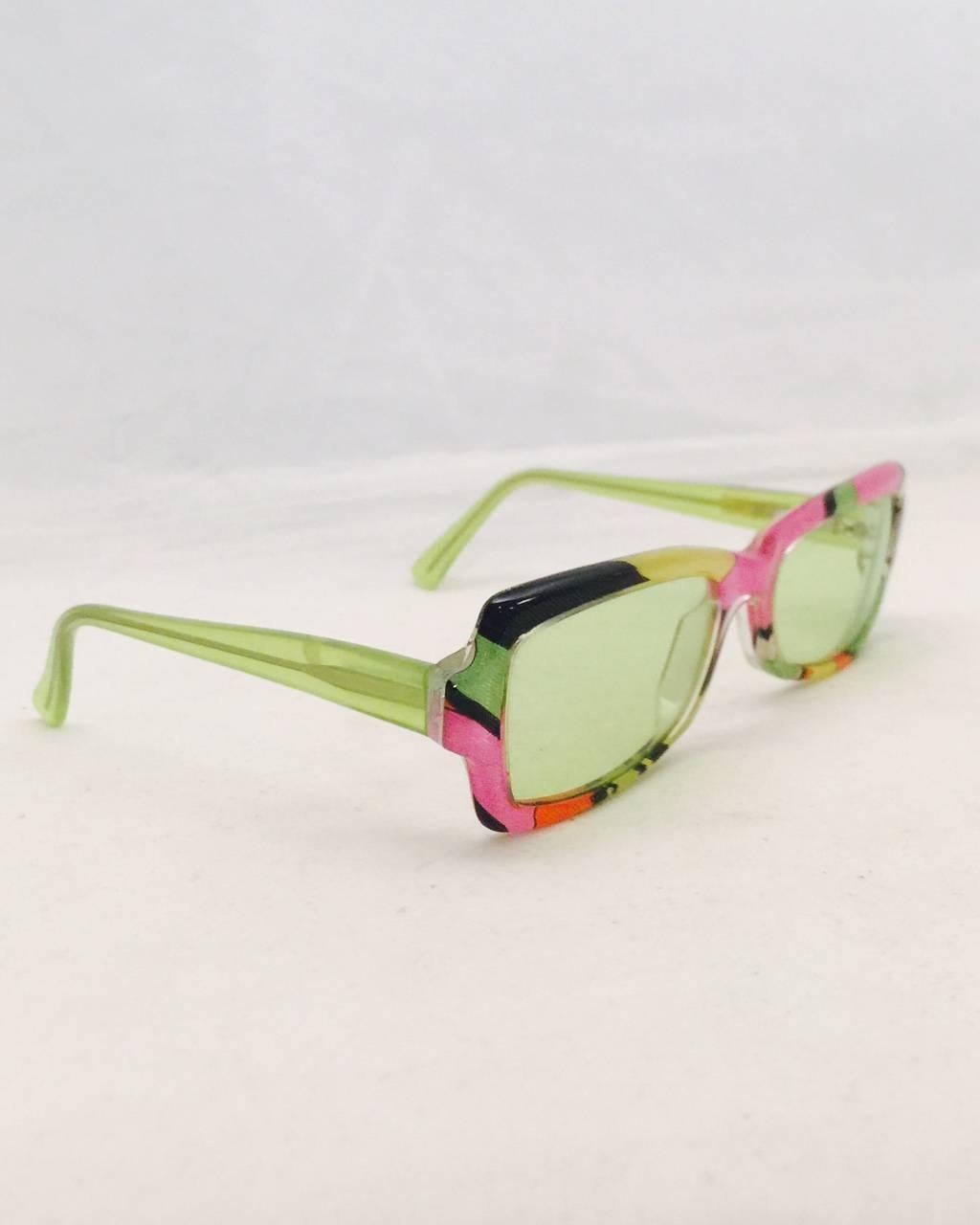 Pining for Pucci? This vintage pair of iconic green, pink and orange signature print sunglasses by Emilio Pucci are a must for any 