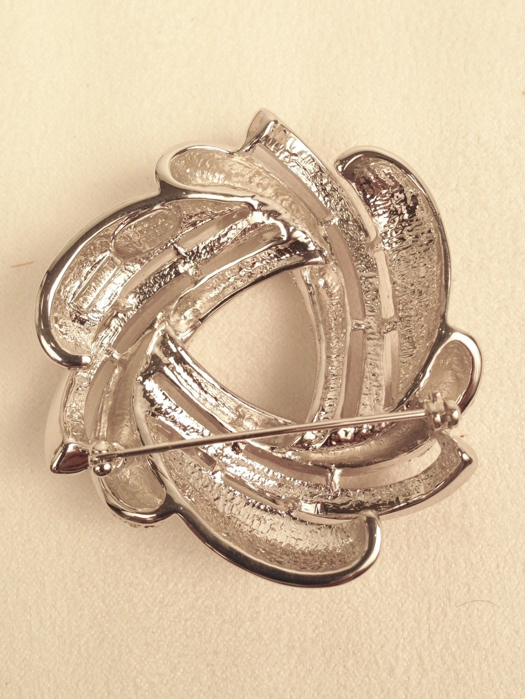 Nolan Miller Glamour Collection Pave Eternity Knot Brooch In New Condition For Sale In Palm Beach, FL