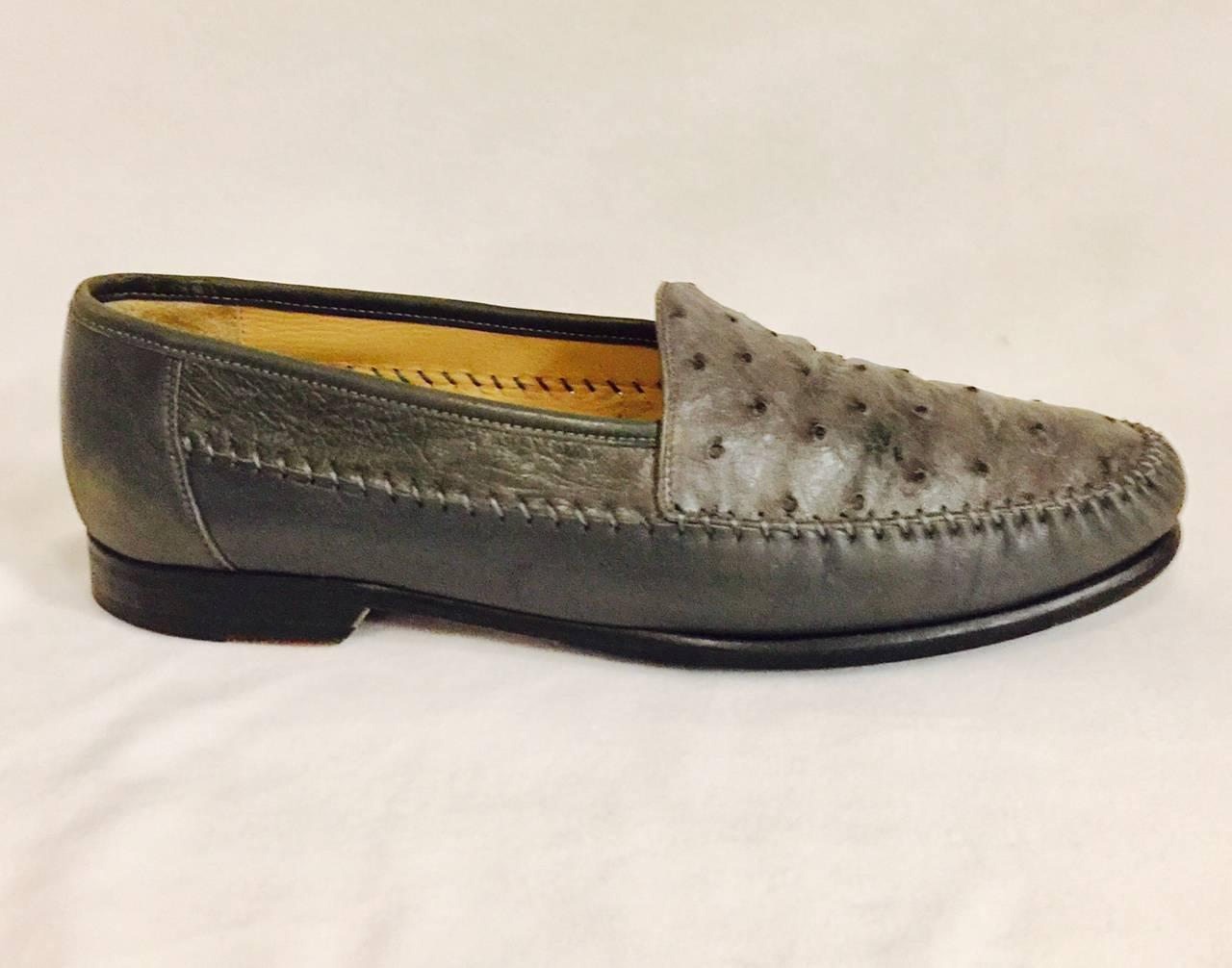 Handsome pair of neutral dove grey  Avventura ostrich loafers, handmade in Spain.  A rubber sole has been added for extra traction, in very good used condition.  Classy and elegant!