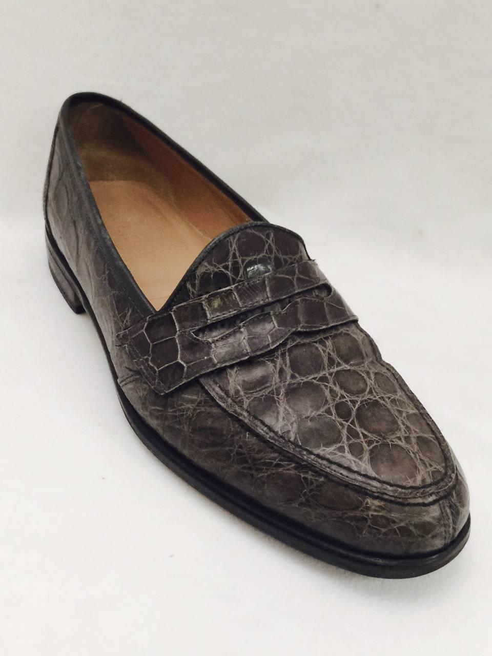 Handmade in Italy, these M.C. Mario Campatelli penny loafers are crafted in genuine neutral light brown crocodile, for an adaptable elegant look that can be either formal dress,  or great with jeans. Fitted with rubber soles for non slip grip.