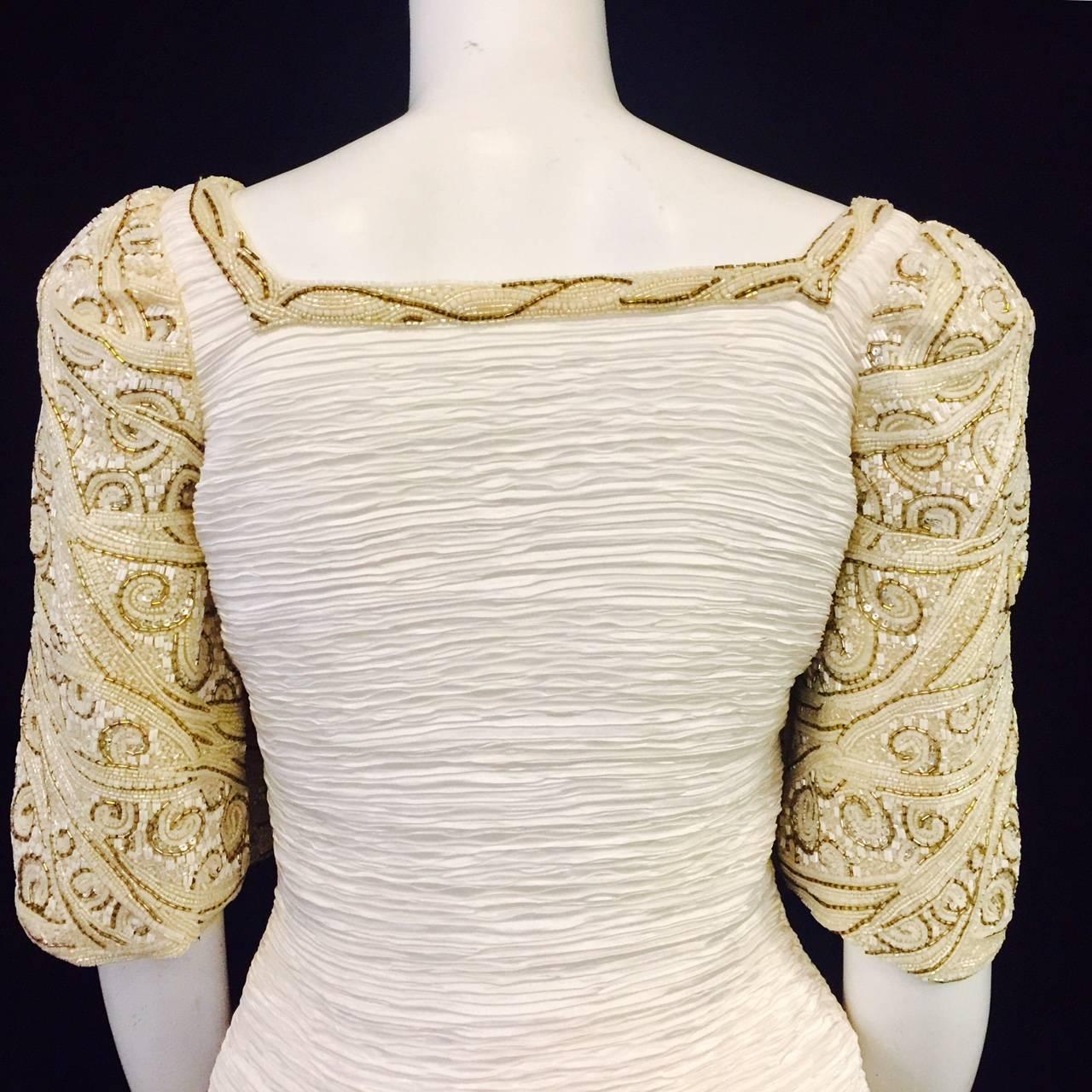 Magnificent Mary McFadden Ivory Gown W Embroidered Sleeves and Neckline For Sale 1