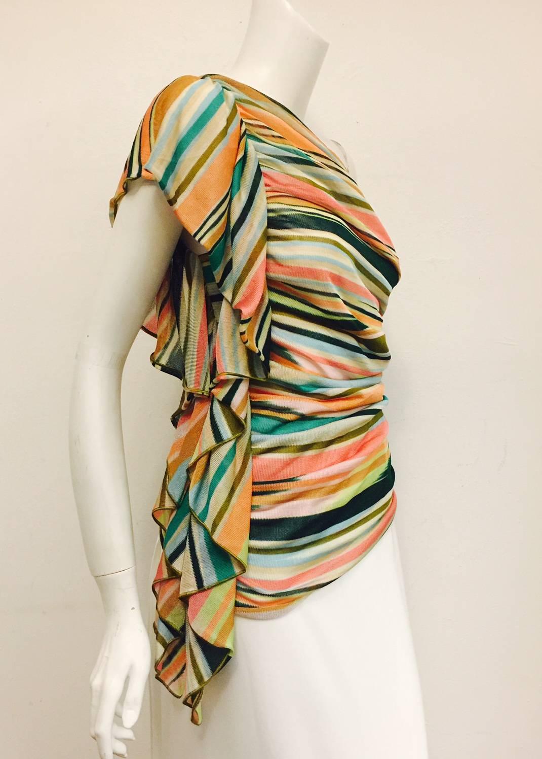 Masterful Missoni multicolor one-shoulder top with ruffle trim at sides, stripe knit pattern throughout and zip closure at side.  It is made of lightweight Viscose.  This top says summer through and through whether you are in Cannes,  the Amalfi