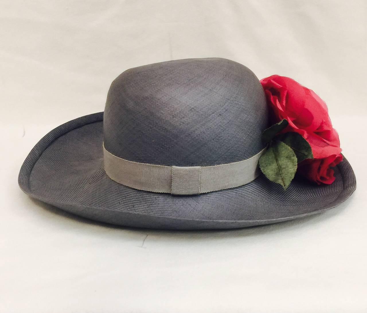 Brown Tres Chic Chanel Light Blue Hat Accentuated With 3 Red Roses