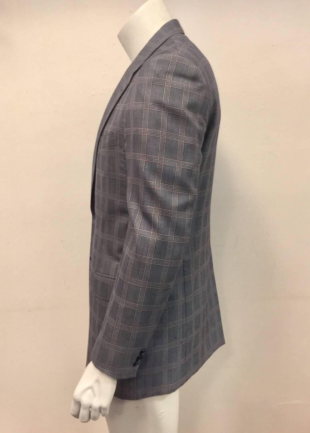 Brioni Palatino jacket in a windowpane check of blue with soft red, fabric is 97 percent wool and 3 percent silk. Made in Italy, for Maus & Hoffman, a premier Palm Beach family owned store that caters to discerning clients, with unique in small
