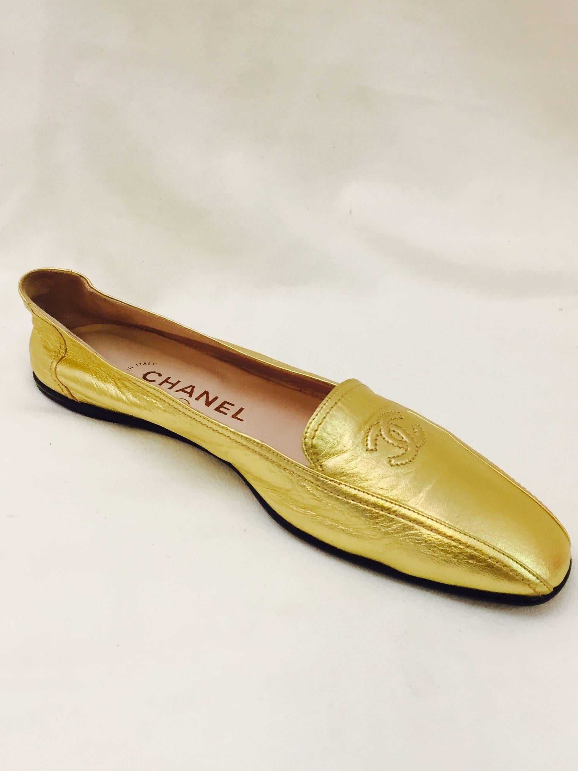 These metallic gold tone Chanel loafers are simply stupendous!  Glamorous ultra-soft soft lambskin makes these shoes feel like your walking on a golden cloud.  Finished with interlocking double 