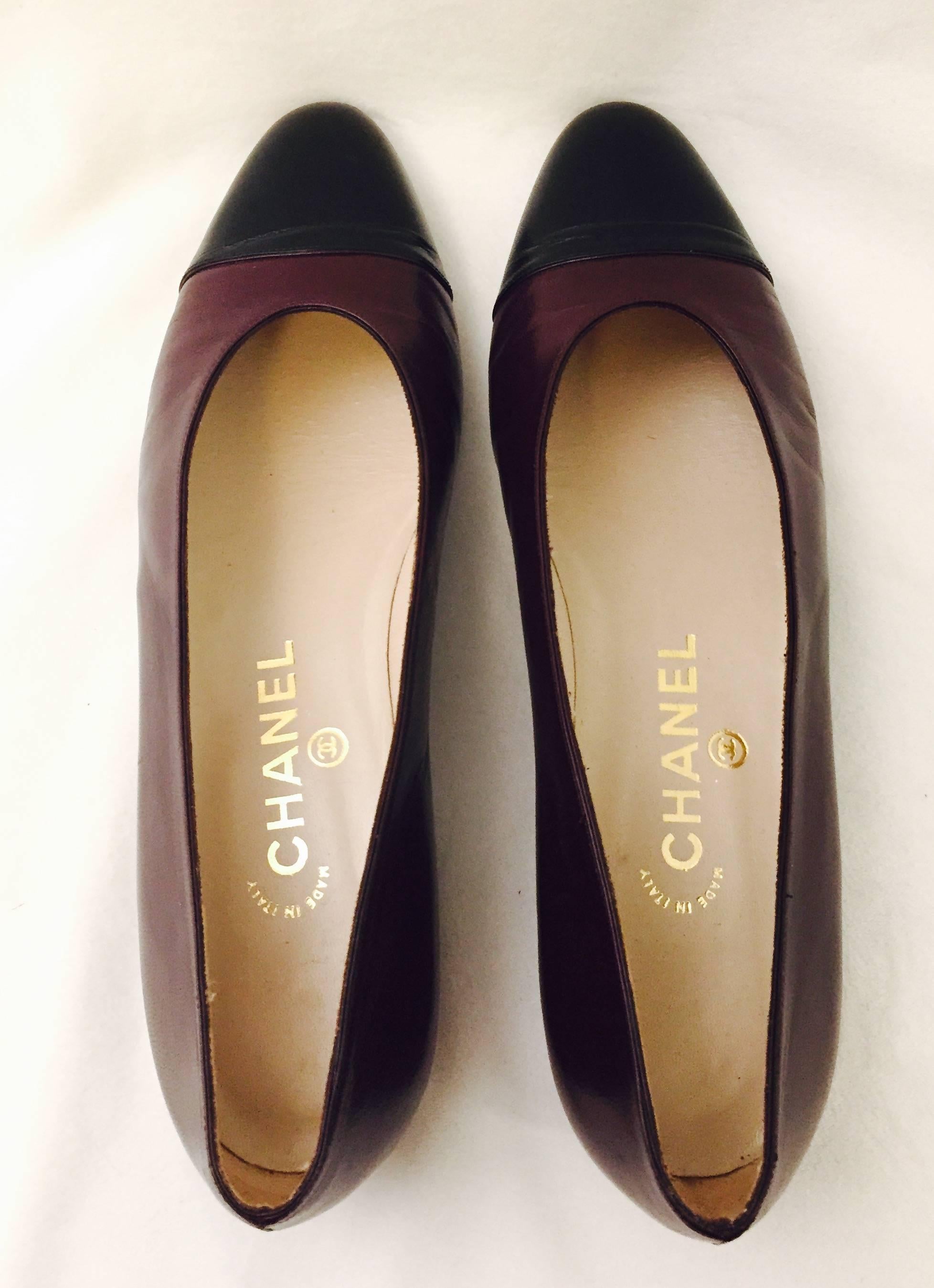 Women's Chanel Deep Burgundy Flats With Black Cap Toes 