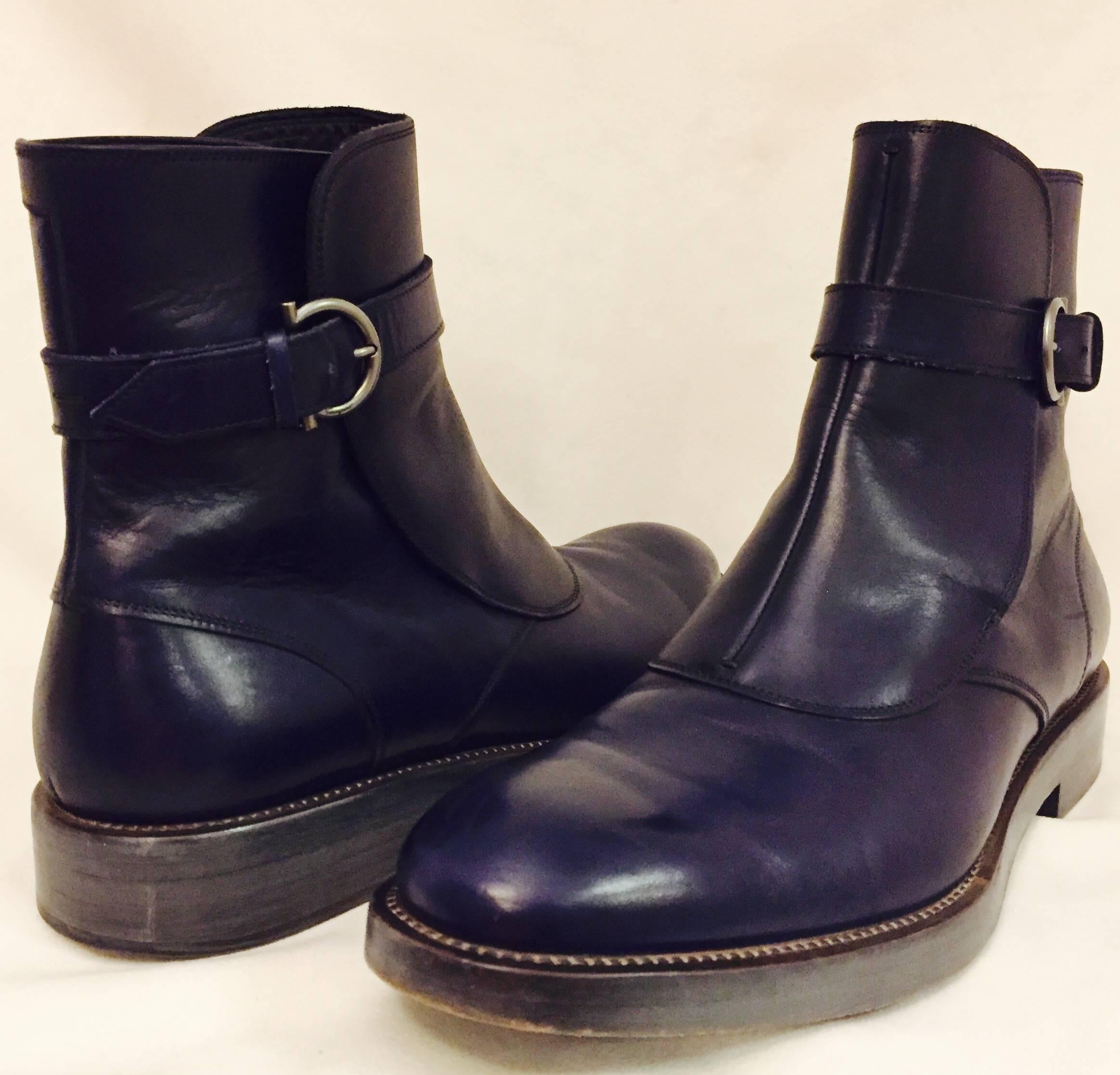 These fabulous Ferragamo ankle boots are in a very unusual lapis blue, sure to turn heads!  Sporting a single strap and a single nickel Gancio buckle adds classic elegance.  The substantial stacked sole is 5/8 inch, and the heel is 1 1/4 inch. Very