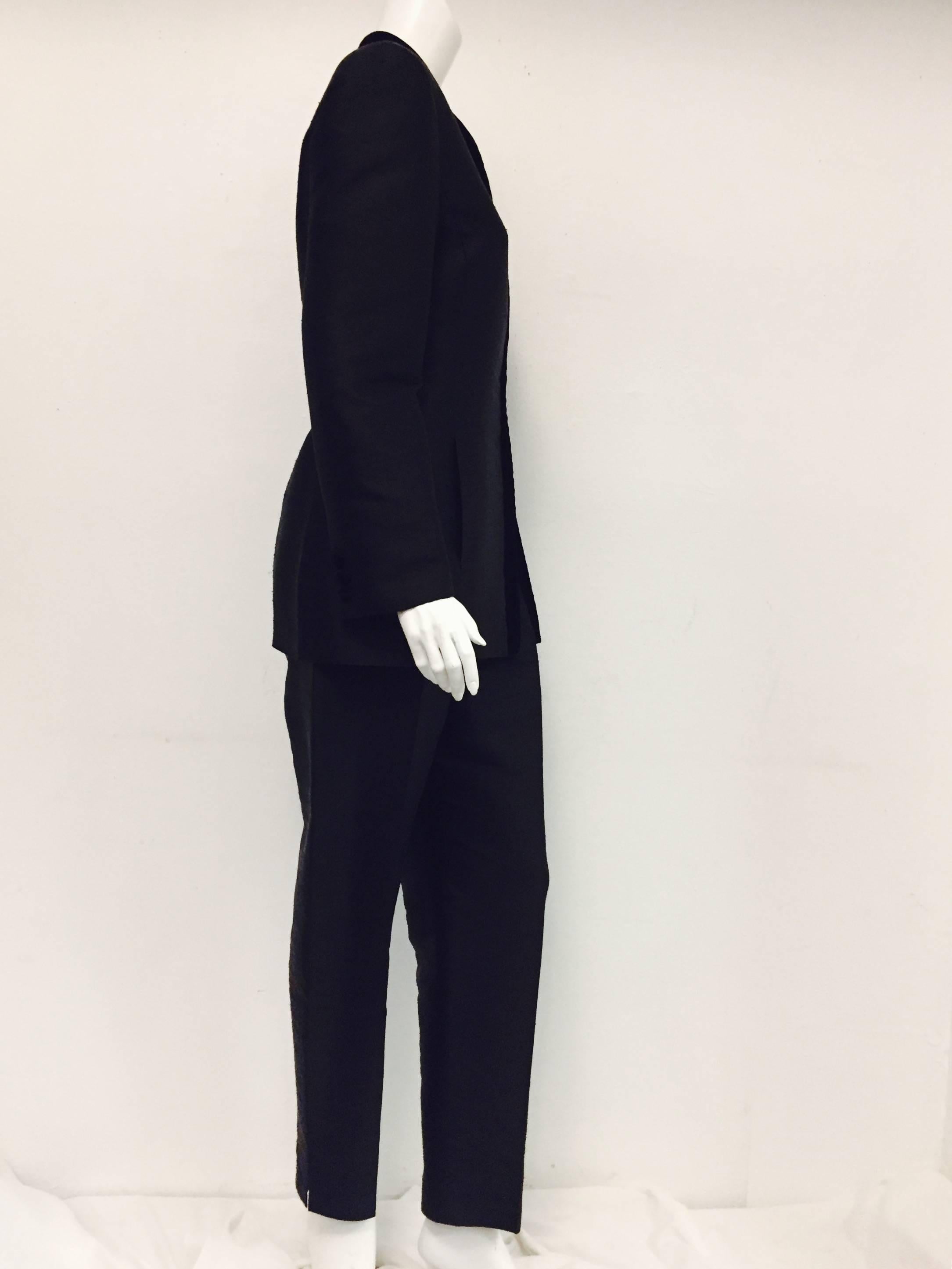 This outstanding Oscar de la Renta Vintage raw silk pant suit is perfect for any occasion night or day!  The Nehru collar as well as the front opening of the suit jacket has 1 1/4