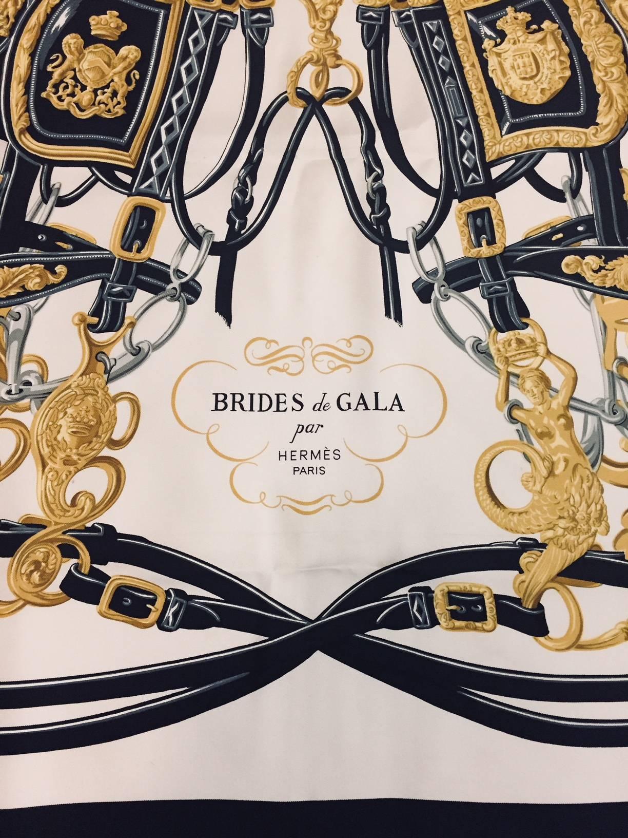 Hermès Brides de Gala Silk Twill Carre by Hugo Grygkar was introduced in 1957 and has become the best selling Hermes scarf of all time.  Truly iconic, this print celebrates equestrian sport at the highest level of achievement in black and white with