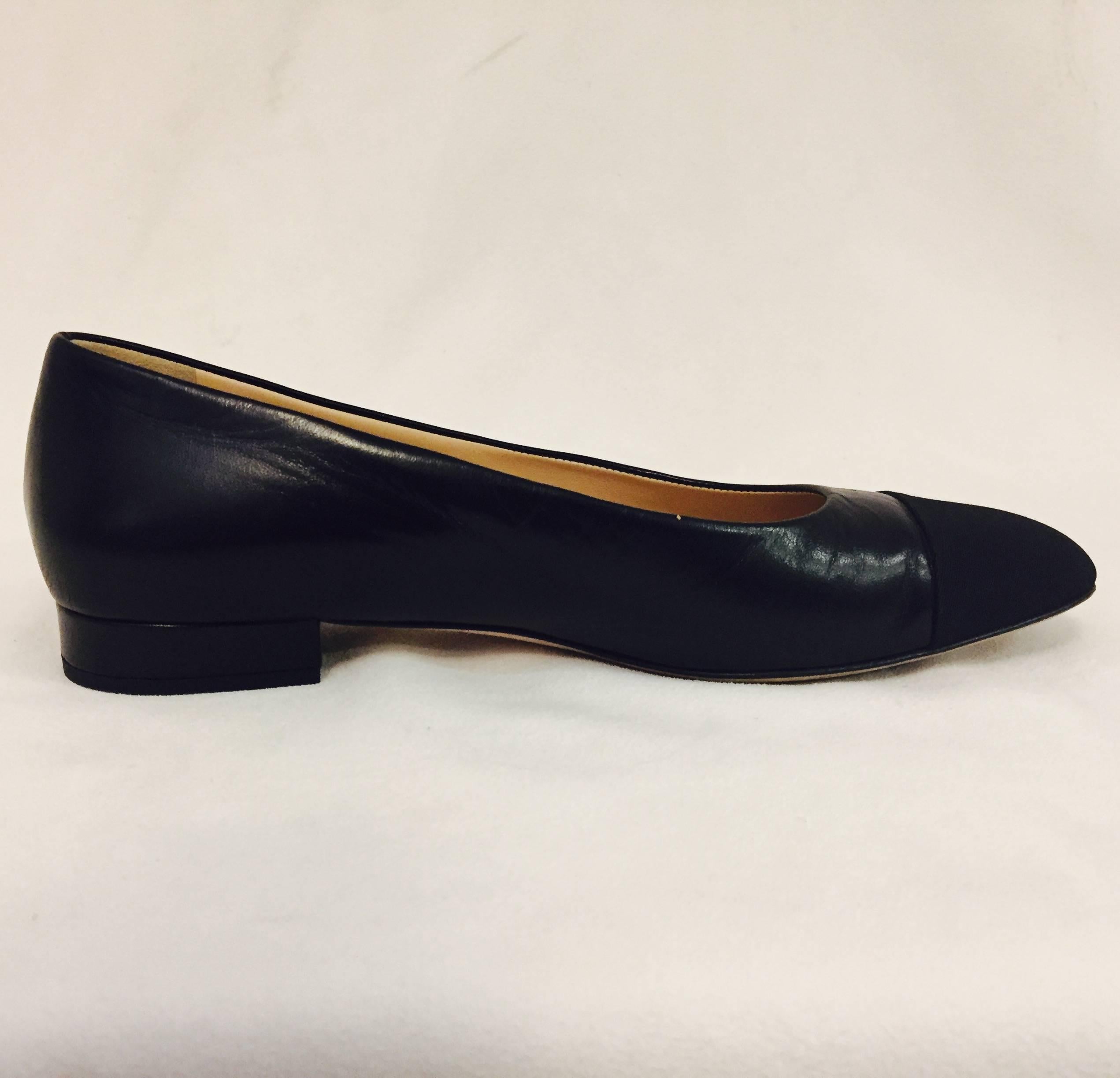 Women's Classic Chanel Black Leather Flats With Black Grosgrain Cap Toes