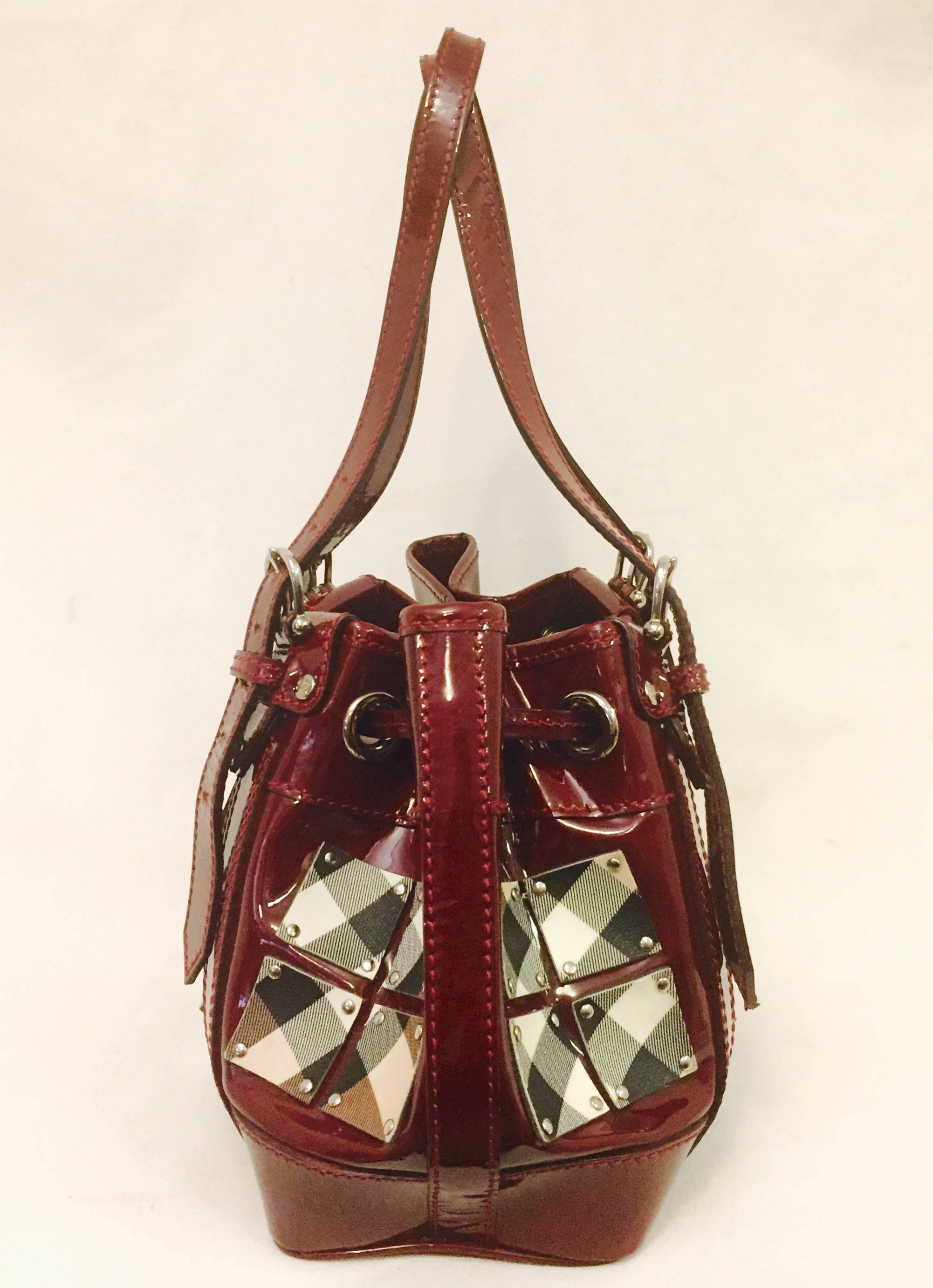 burgundy burberry bag