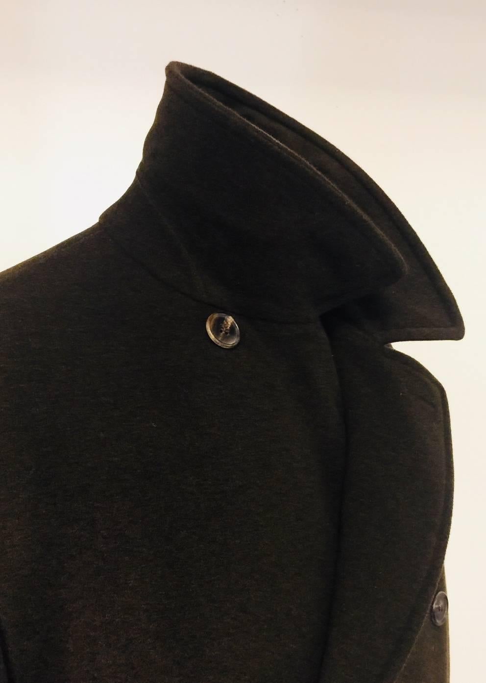 This wonderful  vintage handsome Hermes double breasted classic coat is being offered in time for the coldest weather.  Made from a very heavy cashmere, it has adjustable button cuffs, two slit exterior pockets, a single vent, and a single interior